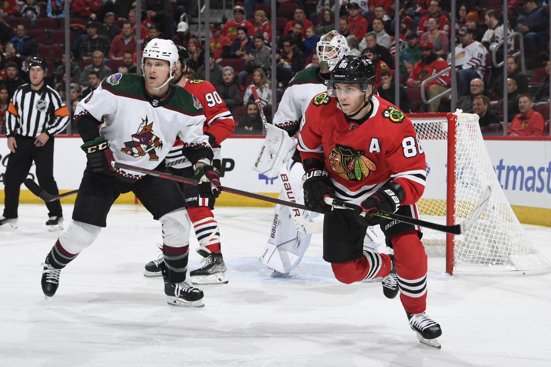 Arizona Coyotes defenseman Jakob Chychrun (left) and Chicago Blackhawks winger Patrick Kane.