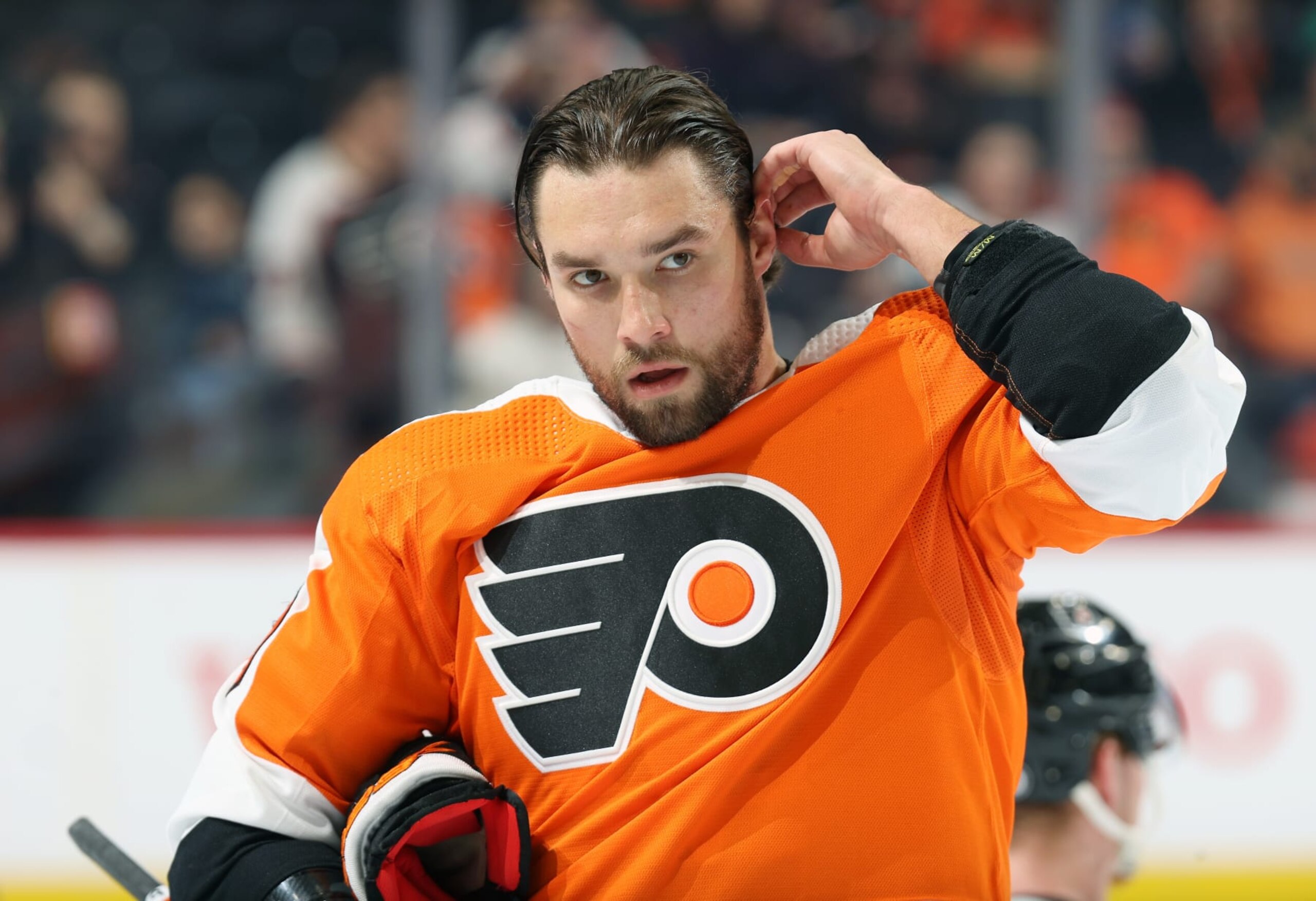 PHILADELPHIA, PENNSYLVANIA - JANUARY 11:  Ivan Provorov #9 of the Philadelphia Flyers looks on during warm-ups prior to his game against the Washington Capitals at the Wells Fargo Center on January 11, 2023 in Philadelphia, Pennsylvania.  (Photo by Len Redkoles/NHLI via Getty Images)