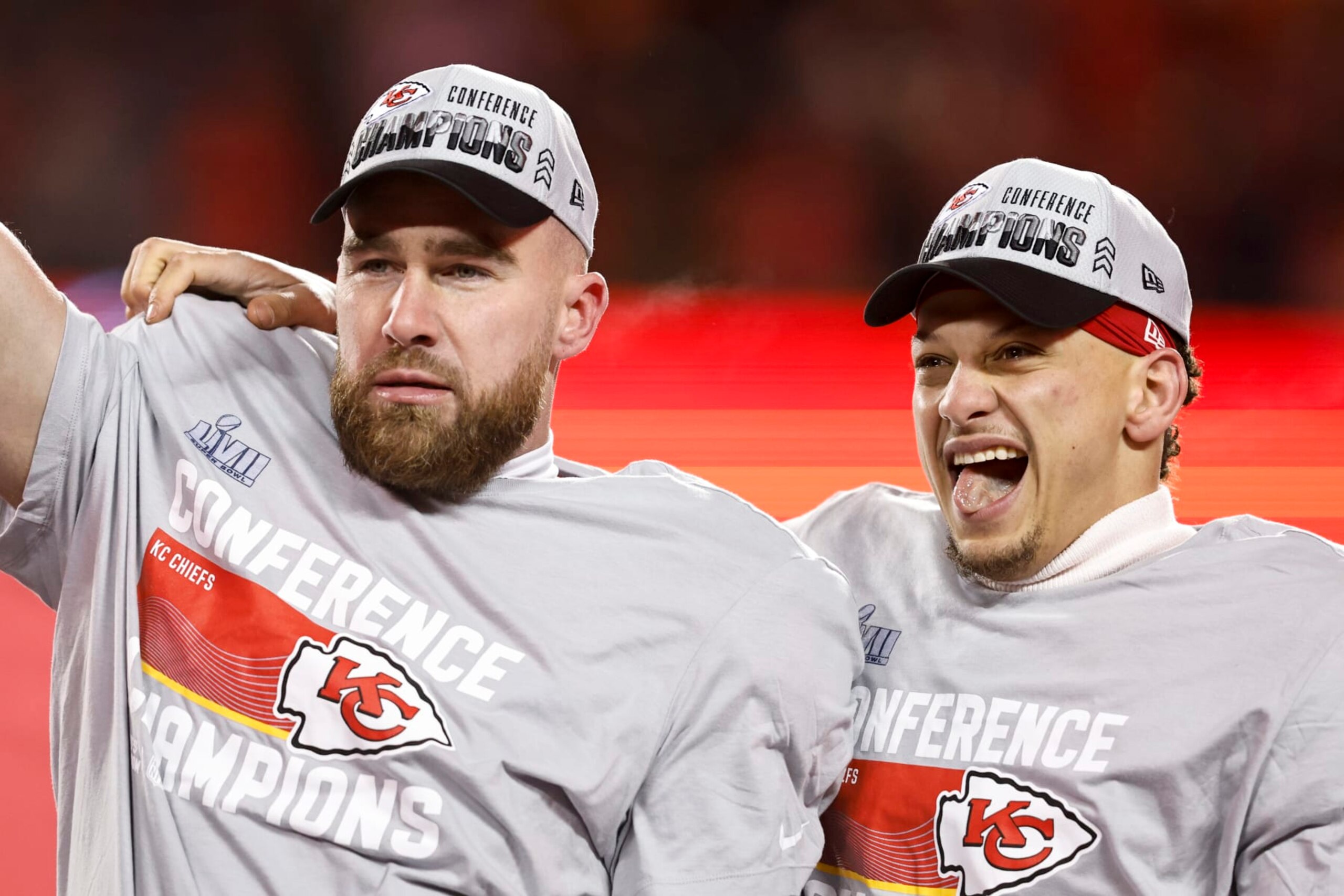 KANSAS CITY, MISSOURI - JANUARY 29: Travis Kelce #87 of the Kansas City Chiefs and Patrick Mahomes #15 of the Kansas City Chiefs celebrate with the Lamar Hunt Trophy after winning the AFC Championship NFL football game between the Kansas City Chiefs and the Cincinnati Bengals at GEHA Field at Arrowhead Stadium on January 29, 2023 in Kansas City, Missouri. (Photo by Michael Owens/Getty Images)