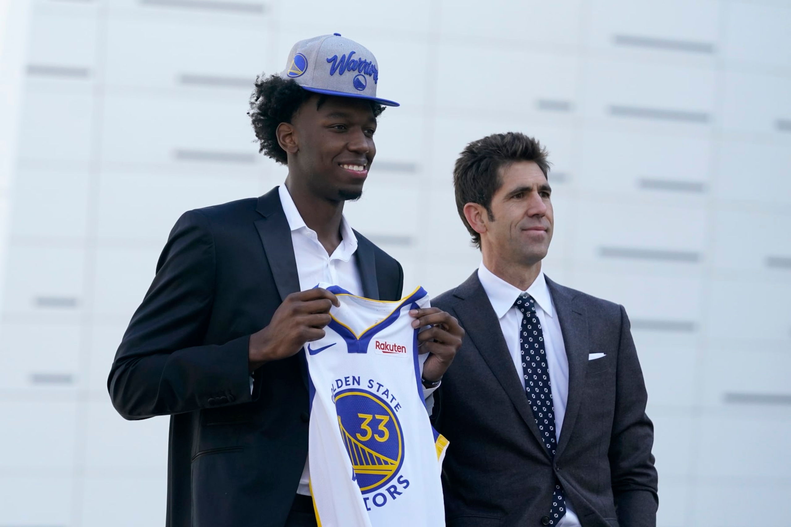 Golden State Warriors draft pick James Wiseman, left, poses next to president of basketball operations and general manager Bob Myers in San Francisco, Thursday, Nov. 19, 2020. (AP Photo/Jeff Chiu)