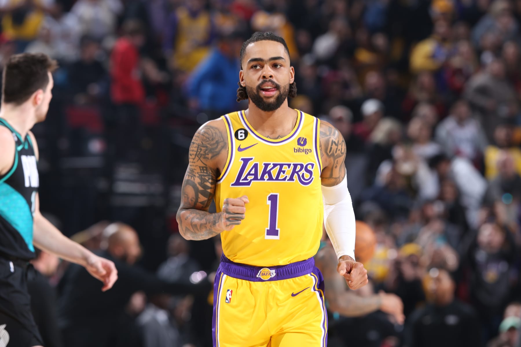 PORTLAND, OR - FEBRUARY 13: DAngelo Russell #1 of the Los Angeles Lakers looks on during the game against the Portland Trail Blazers on February 13, 2023 at the Moda Center Arena in Portland, Oregon. NOTE TO USER: User expressly acknowledges and agrees that, by downloading and or using this photograph, user is consenting to the terms and conditions of the Getty Images License Agreement. Mandatory Copyright Notice: Copyright 2023 NBAE (Photo by Sam Forencich/NBAE via Getty Images)