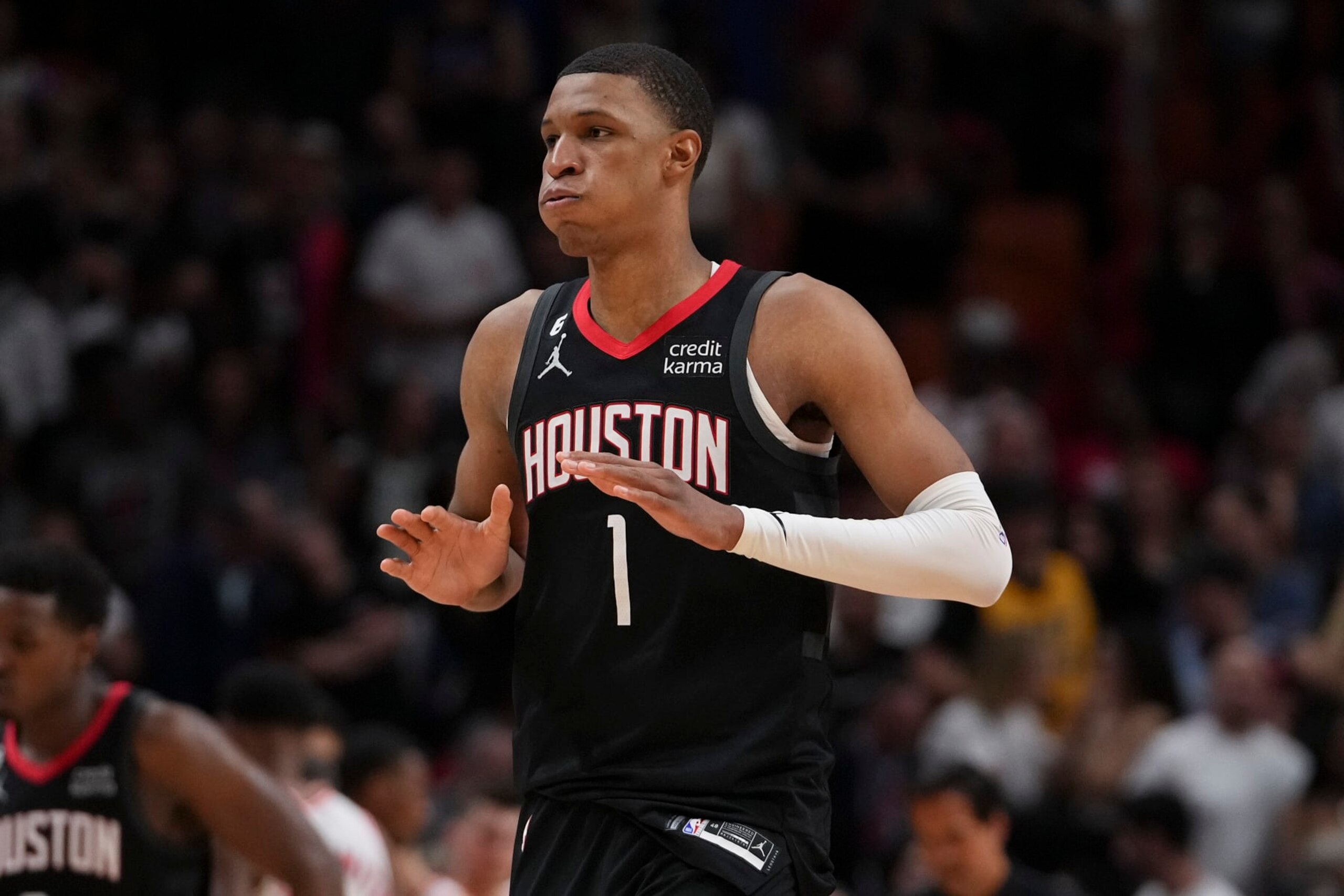 MIAMI, FLORIDA - FEBRUARY 10: Jabari Smith Jr. #1 of the Houston Rockets celebrates after hitting a free throw with 10.9 seconds left in the fourth quarter against the Miami Heat at Miami-Dade Arena on February 10, 2023 in Miami, Florida. NOTE TO USER: User expressly acknowledges and agrees that,  by downloading and or using this photograph,  User is consenting to the terms and conditions of the Getty Images License Agreement. (Photo by Eric Espada/Getty Images)