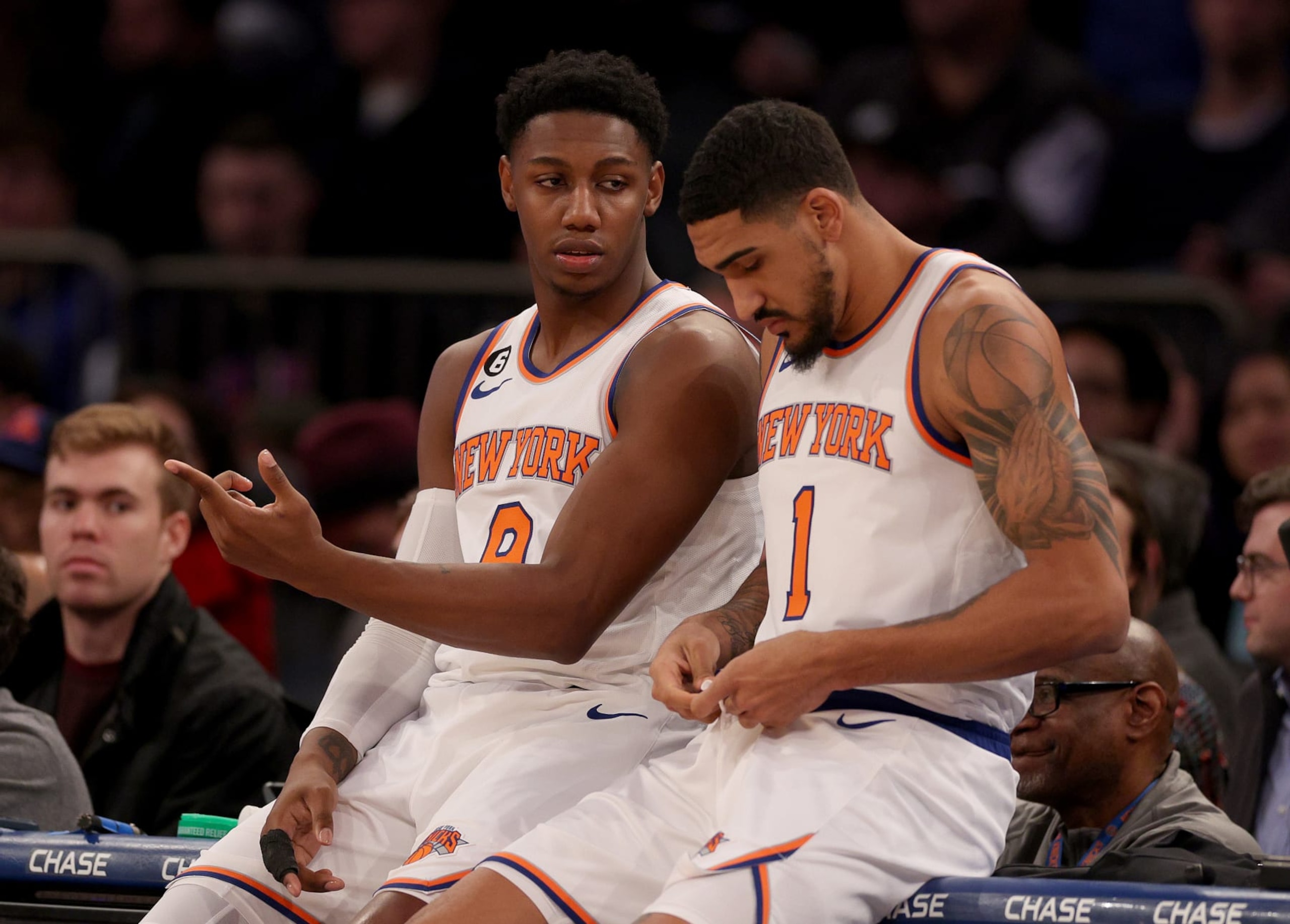 NEW YORK, NEW YORK - JANUARY 11:  RJ Barrett #9 and Obi Toppin #1 of the New York Knicks wait to be subbed in the game in the first quarter against the Indiana Pacers at Madison Square Garden on January 11, 2023 in New York City. NOTE TO USER: User expressly acknowledges and agrees that, by downloading and or using this photograph, User is consenting to the terms and conditions of the Getty Images License Agreement. (Photo by Elsa/Getty Images)