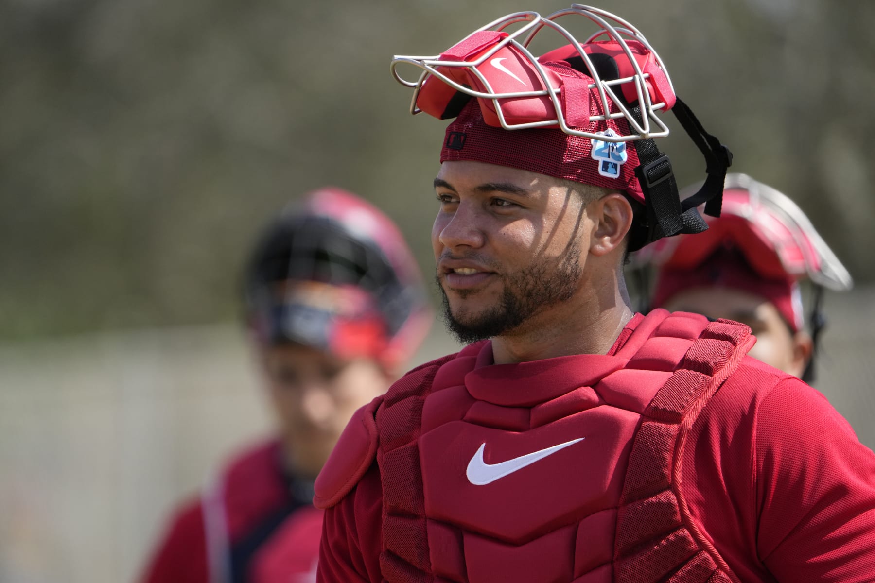 St. Louis Cardinals catcher Willson Contreras heads out to the field during spring training baseball practice Wednesday, Feb. 15, 2023, in Jupiter, Fla. (AP Photo/Jeff Roberson)