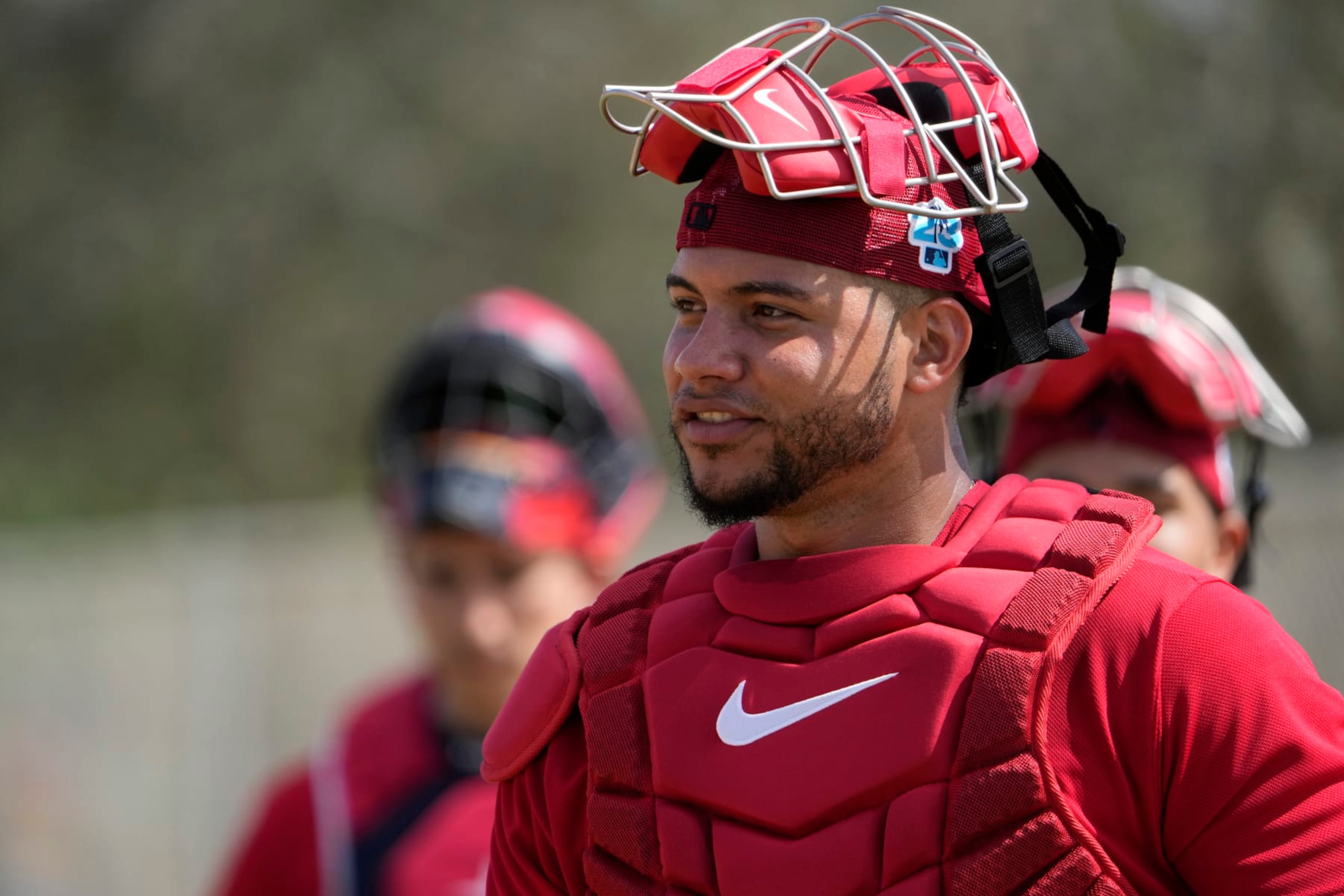 St. Louis Cardinals catcher Willson Contreras heads out to the field during spring training baseball practice Wednesday, Feb. 15, 2023, in Jupiter, Fla. (AP Photo/Jeff Roberson)