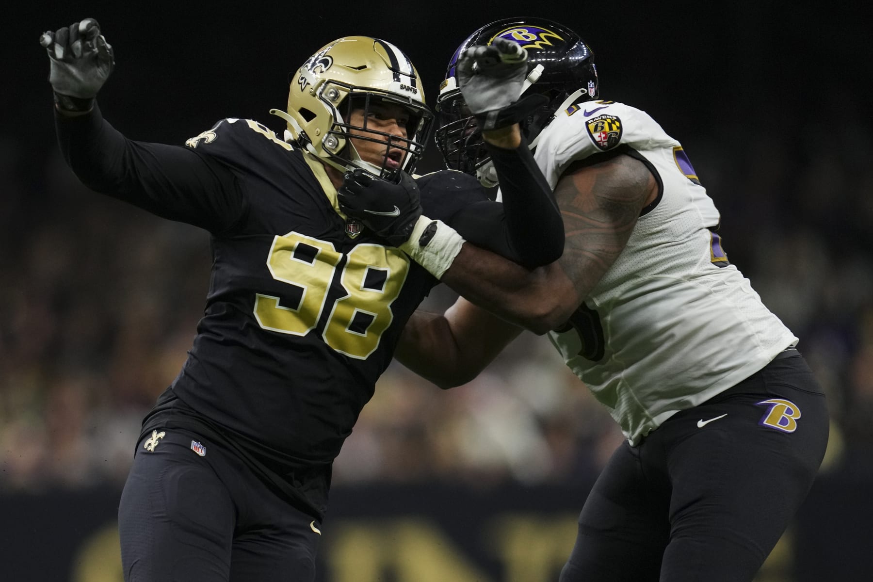 NEW ORLEANS, LA - NOVEMBER 07: Payton Turner #98 of the New Orleans Saints battles with Ronnie Stanley #79 of the Baltimore Ravens at Caesars Superdome on November 7, 2022 in New Orleans, Louisiana. (Photo by Cooper Neill/Getty Images)