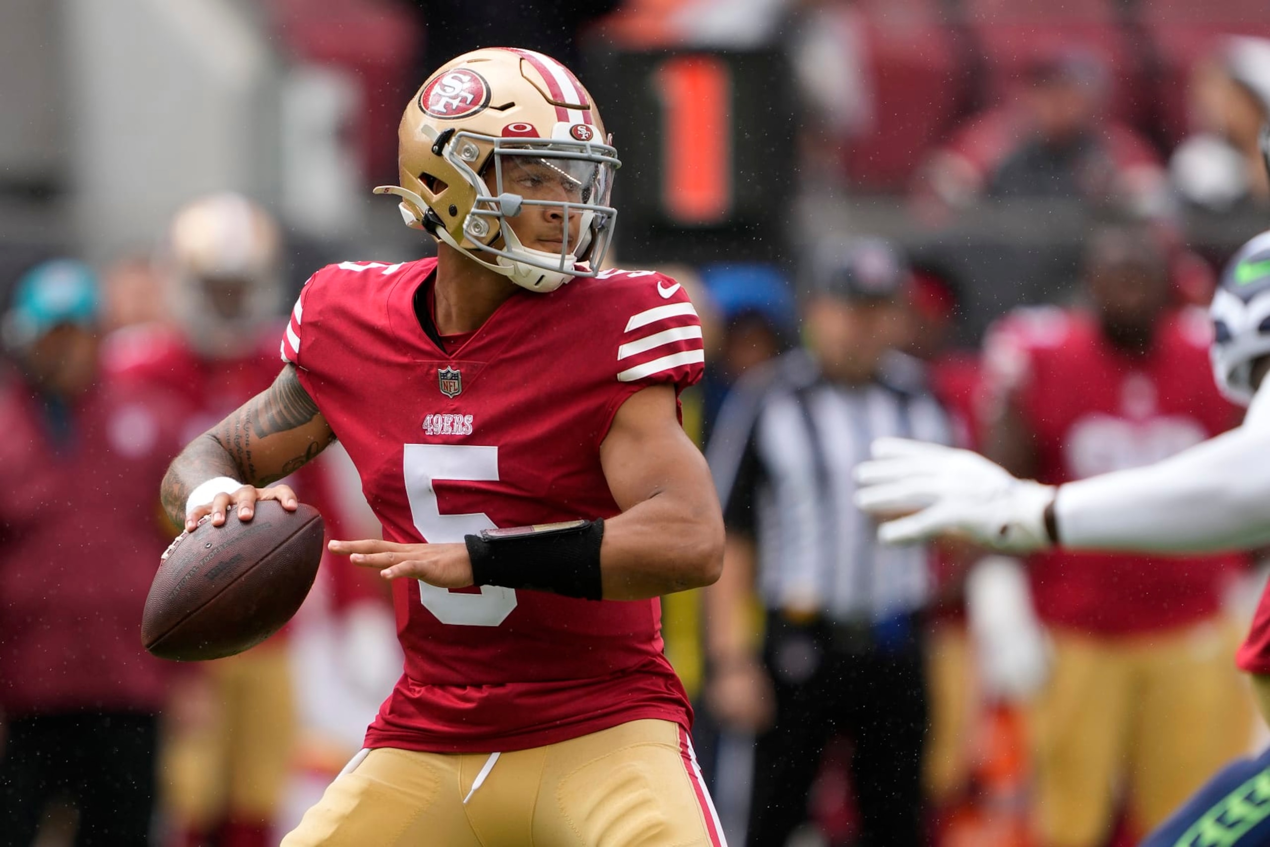 SANTA CLARA, CALIFORNIA - SEPTEMBER 18: Trey Lance #5 of the San Francisco 49ers looks to pass the ball against the Seattle Seahawks during the first quarter at Levi's Stadium on September 18, 2022 in Santa Clara, California. (Photo by Thearon W. Henderson/Getty Images)