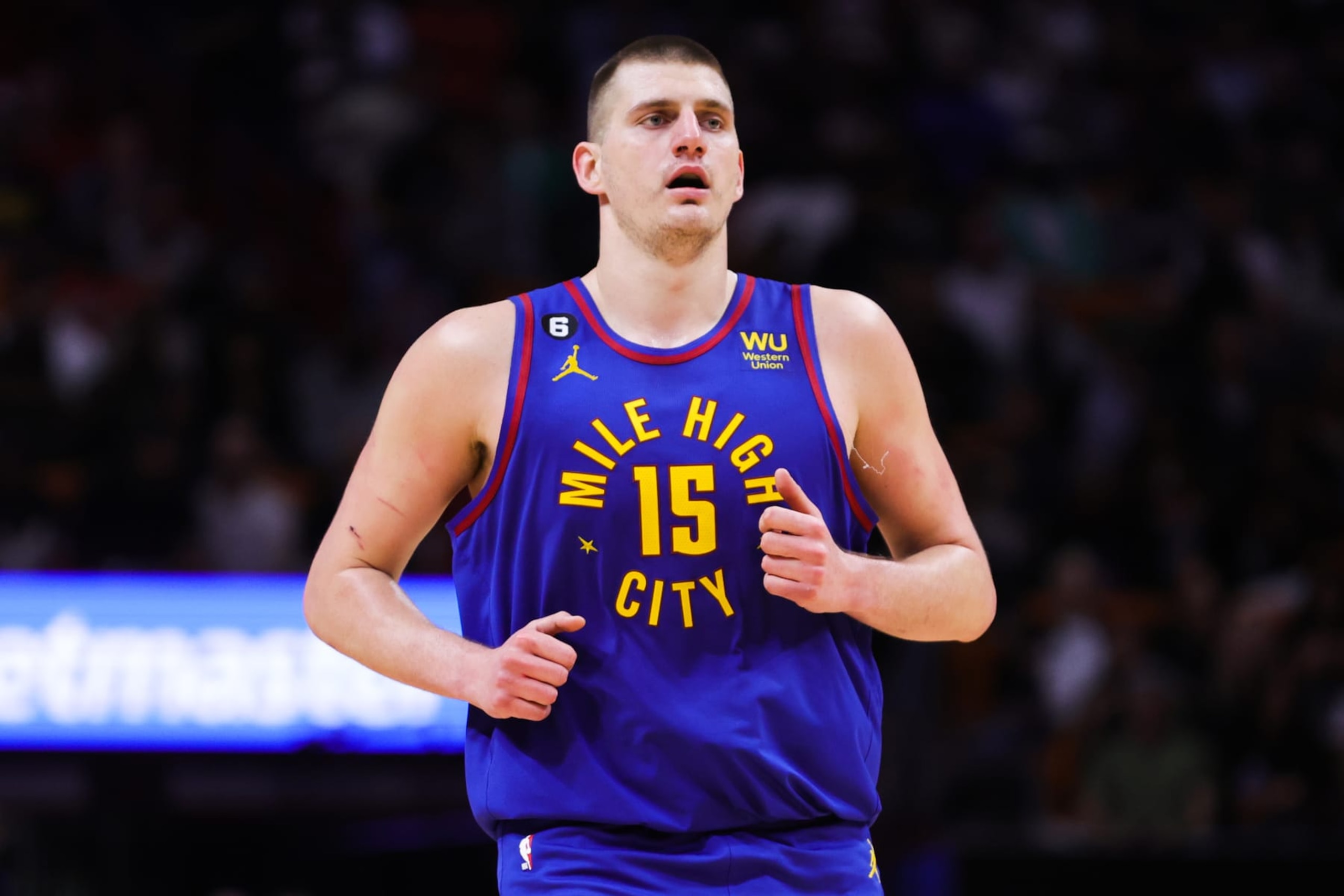 MIAMI, FLORIDA - FEBRUARY 13: Nikola Jokic #15 of the Denver Nuggets looks on against the Miami Heat during the second quarter of the game at Miami-Dade Arena on February 13, 2023 in Miami, Florida. NOTE TO USER: User expressly acknowledges and agrees that, by downloading and or using this photograph, User is consenting to the terms and conditions of the Getty Images License Agreement. (Photo by Megan Briggs/Getty Images)