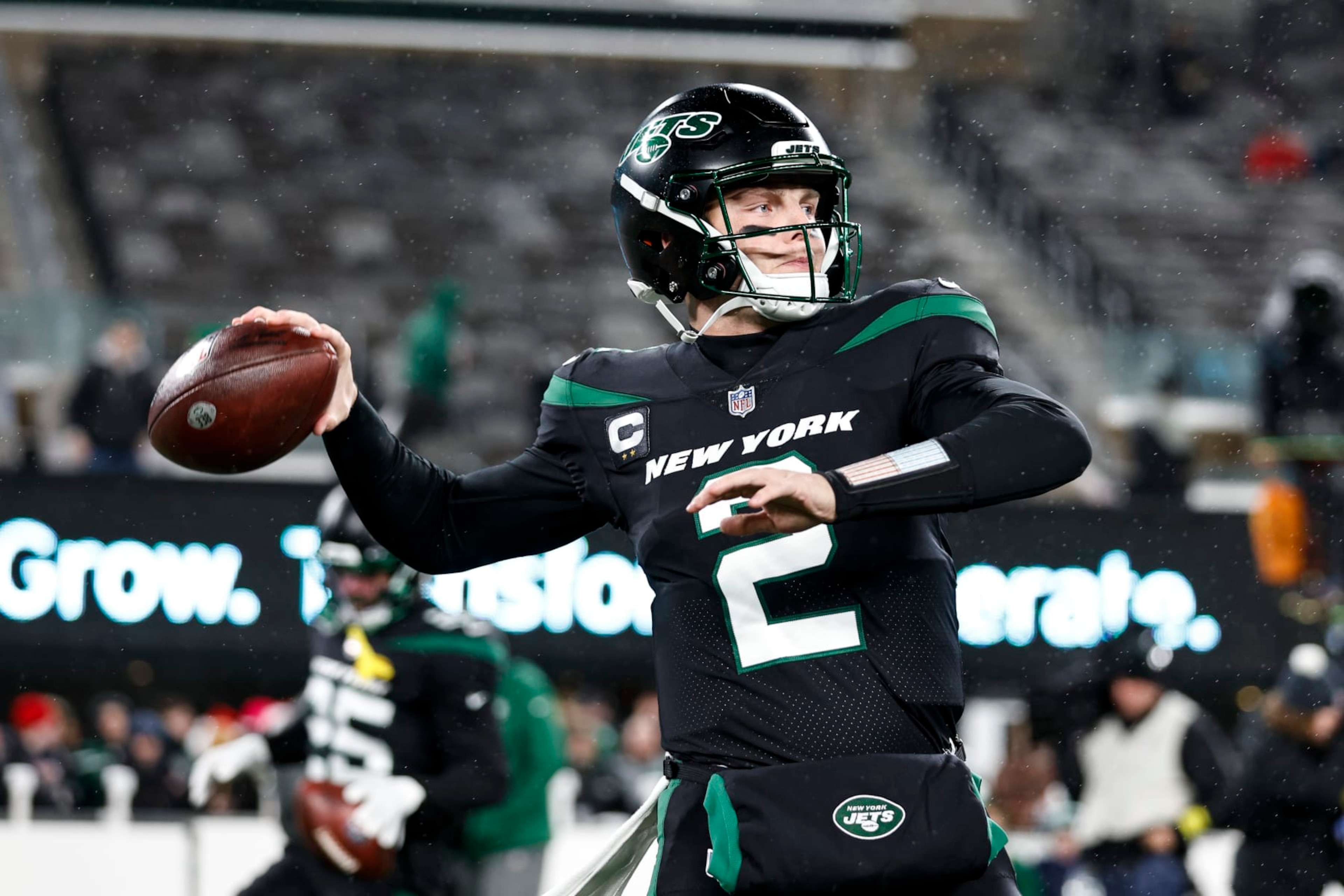 EAST RUTHERFORD, NEW JERSEY - DECEMBER 22: Zach Wilson #2 of the New York Jets passes as he warms up prior to an NFL football game between the New York Jets and the Jacksonville Jaguars at MetLife Stadium on December 22, 2022 in East Rutherford, New Jersey. (Photo by Michael Owens/Getty Images)