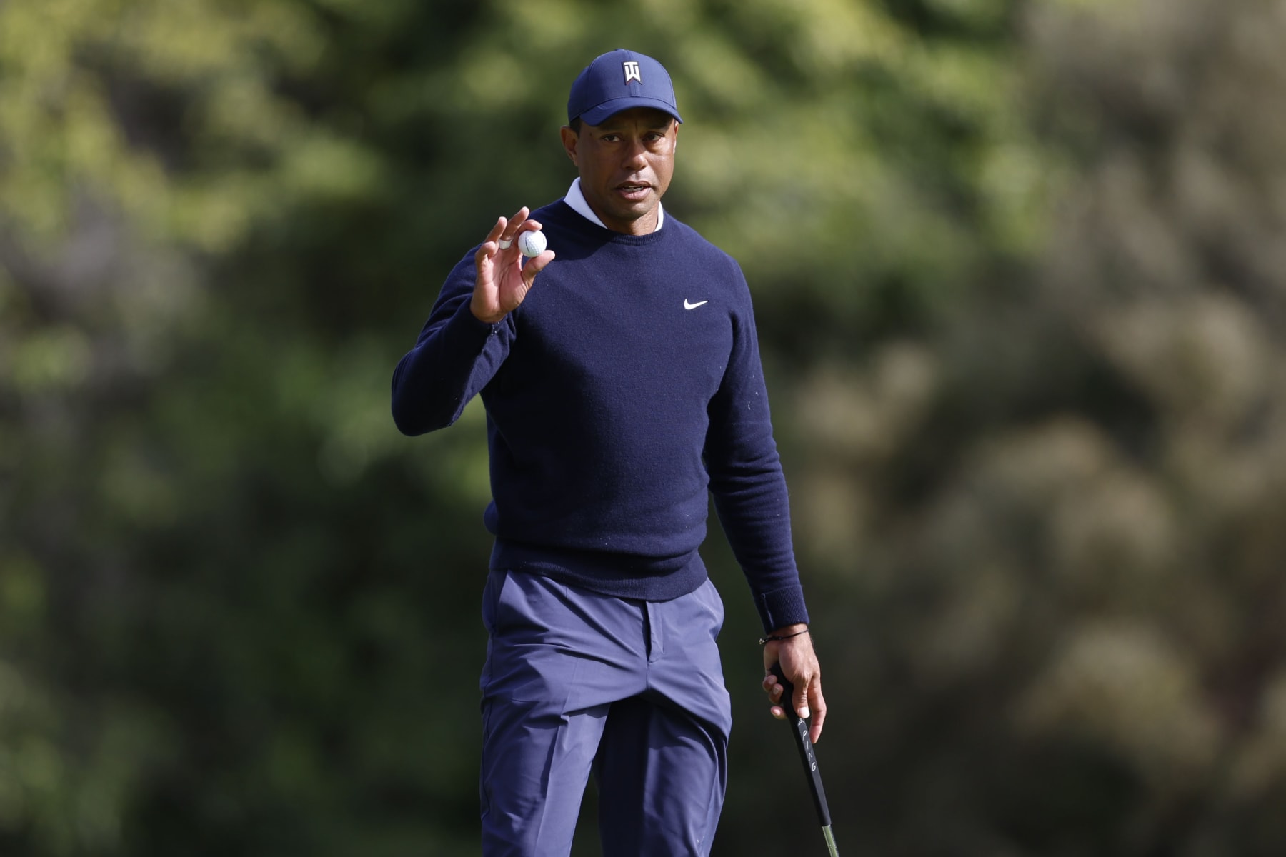 Tiger Woods acknowledges the gallery on the ninth hole during the first round of the Genesis Invitational golf tournament at Riviera Country Club, Thursday, Feb. 16, 2023, in the Pacific Palisades area of Los Angeles. (AP Photo/Ryan Kang)