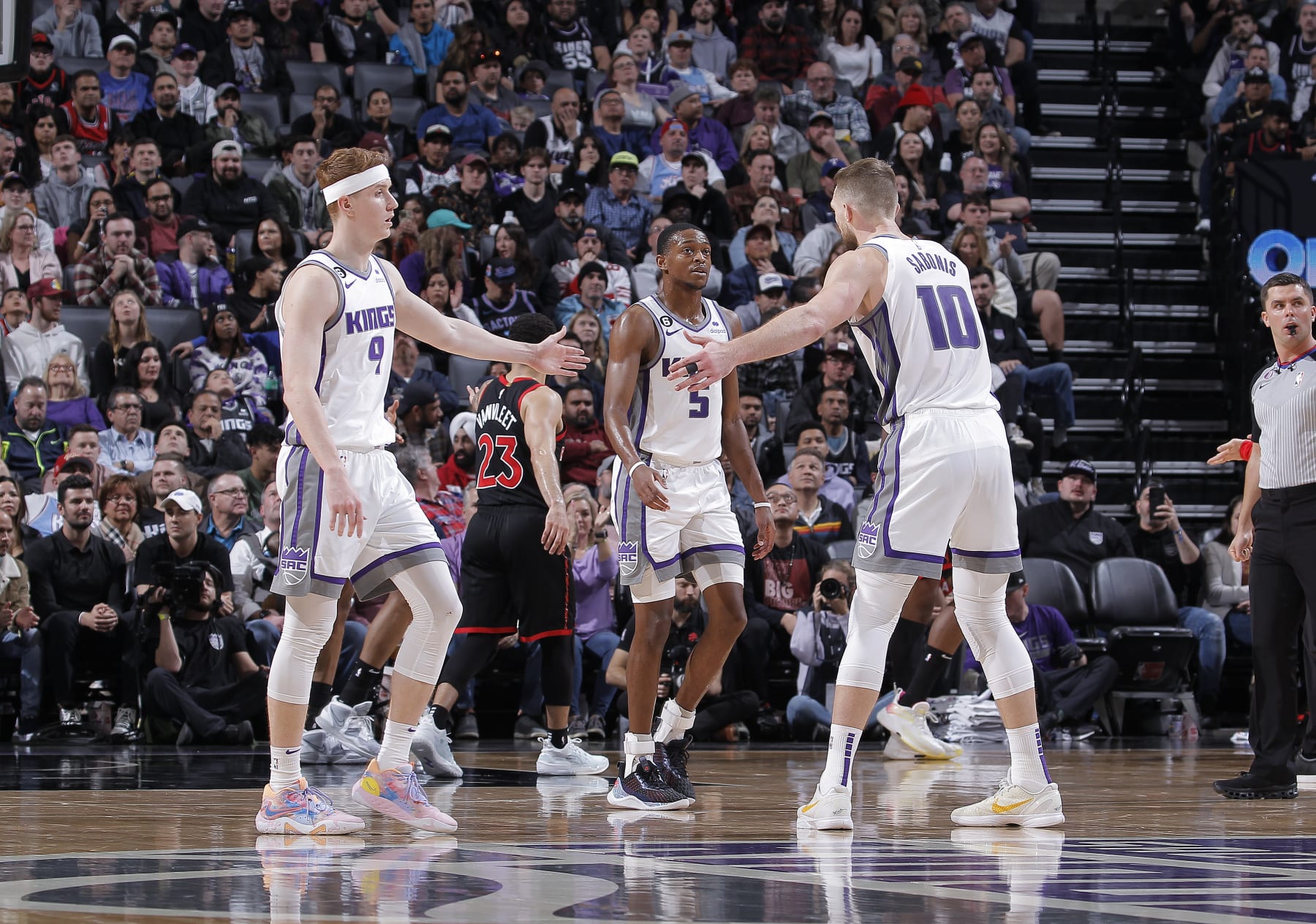 De'Aaron Fox, Kevin Huerter and Domantas Sabonis.