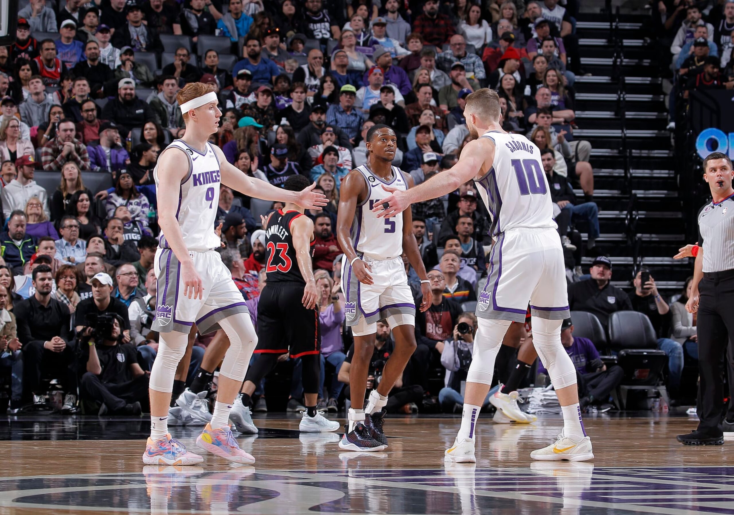 De'Aaron Fox, Kevin Huerter and Domantas Sabonis. De'Aaron Fox, Kevin Huerter and Domantas Sabonis.