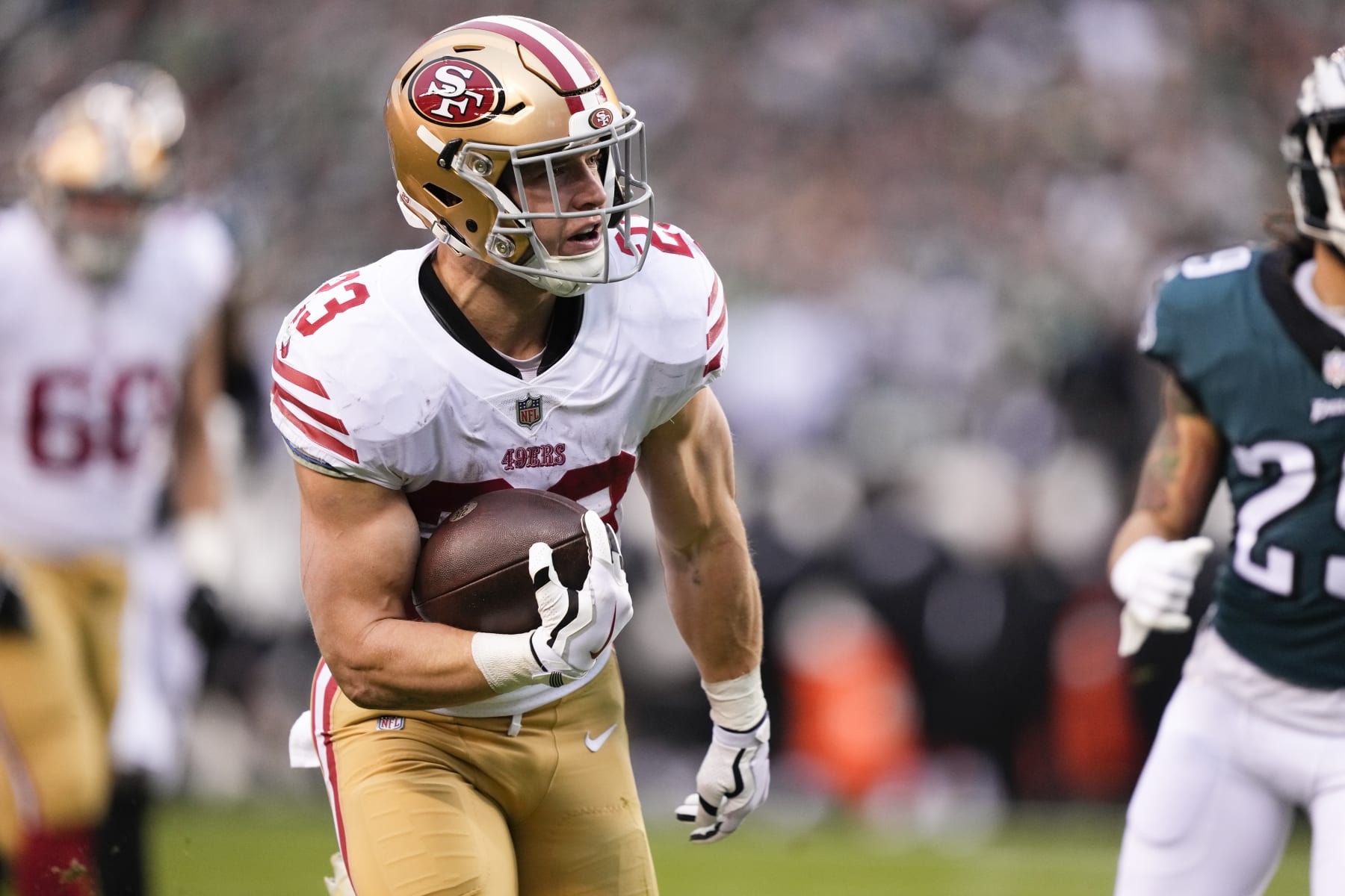 San Francisco 49ers running back Christian McCaffrey runs for a touchdown during the first half of the NFC Championship NFL football game between the Philadelphia Eagles and the San Francisco 49ers on Sunday, Jan. 29, 2023, in Philadelphia. (AP Photo/Matt Rourke)