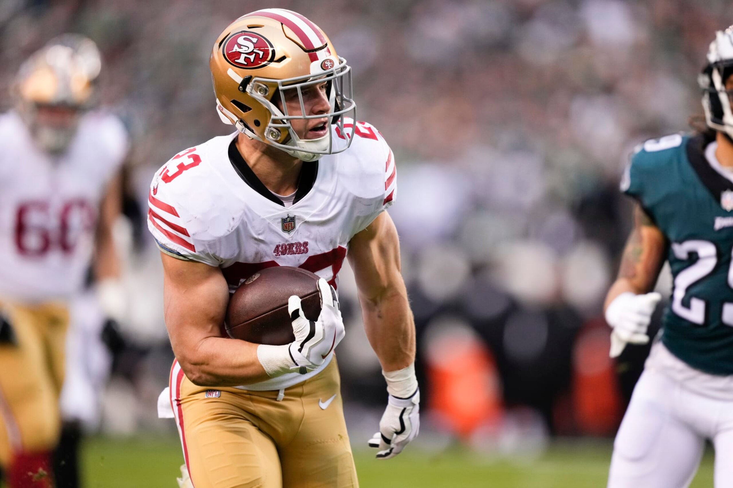 San Francisco 49ers running back Christian McCaffrey runs for a touchdown during the first half of the NFC Championship NFL football game between the Philadelphia Eagles and the San Francisco 49ers on Sunday, Jan. 29, 2023, in Philadelphia. (AP Photo/Matt Rourke)