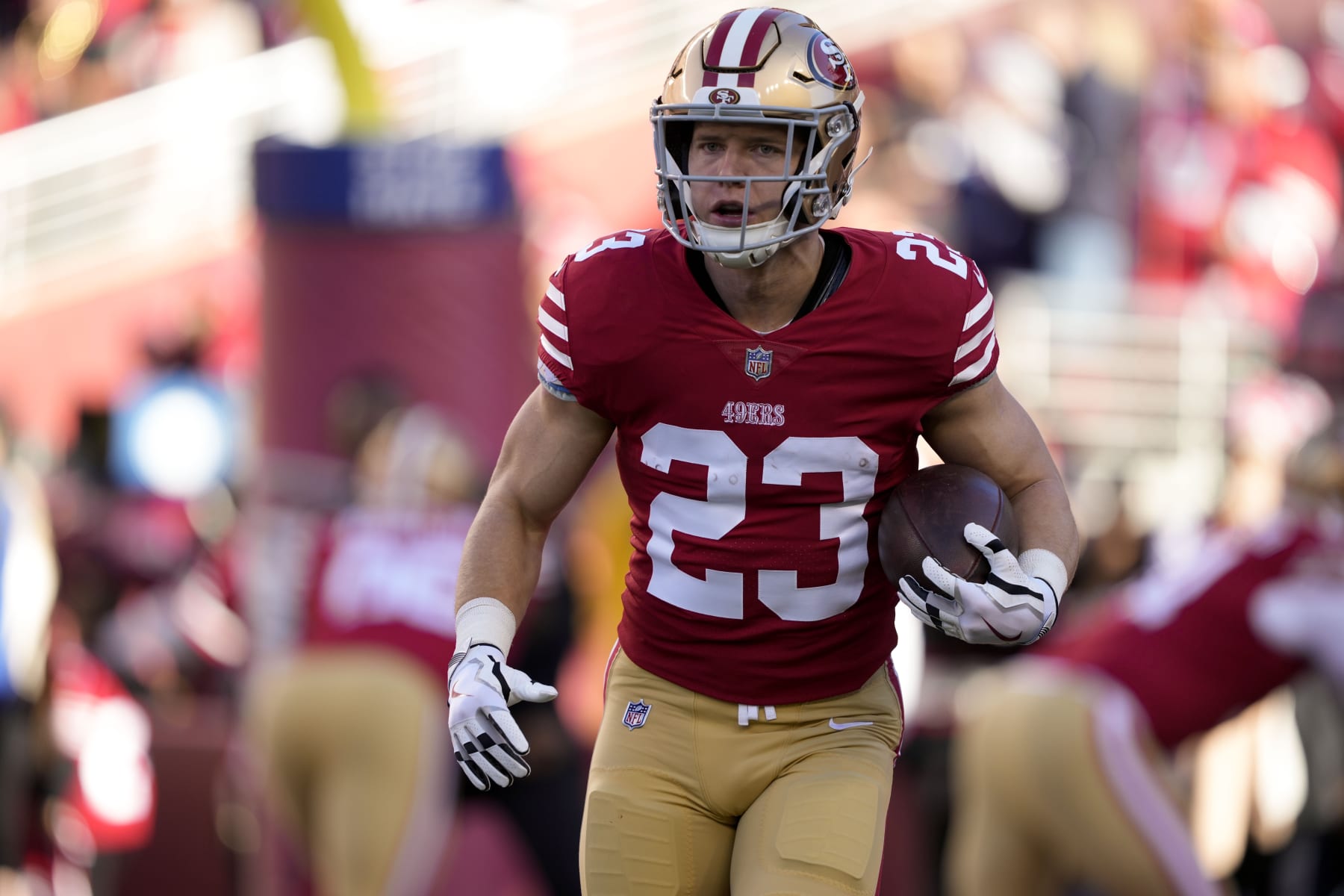 San Francisco 49ers running back Christian McCaffrey (23) warms up before an NFL divisional round playoff football game against the Dallas Cowboys in Santa Clara, Calif., Sunday, Jan. 22, 2023. (AP Photo/Tony Avelar)