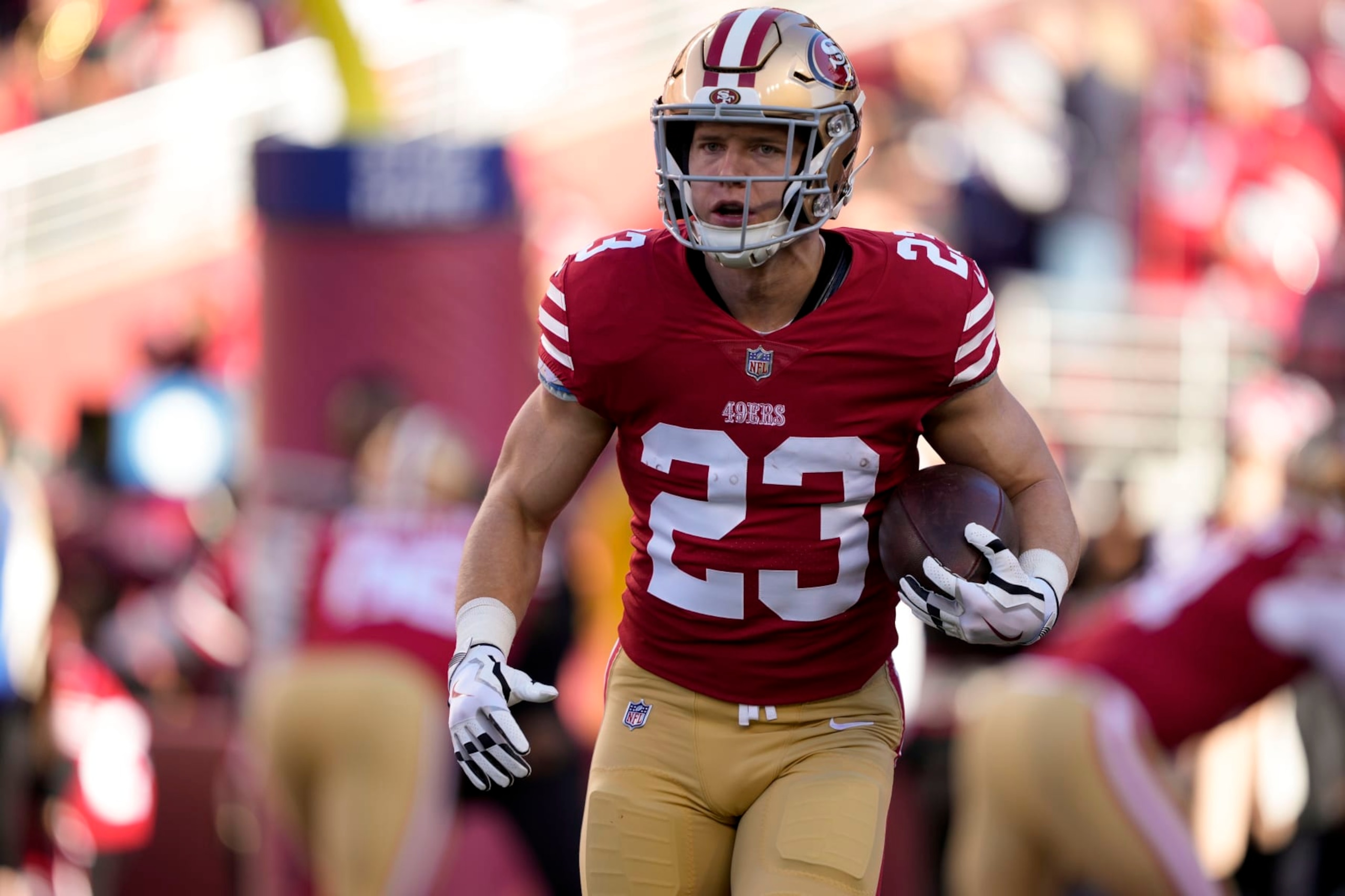 San Francisco 49ers running back Christian McCaffrey (23) warms up before an NFL divisional round playoff football game against the Dallas Cowboys in Santa Clara, Calif., Sunday, Jan. 22, 2023. (AP Photo/Tony Avelar)