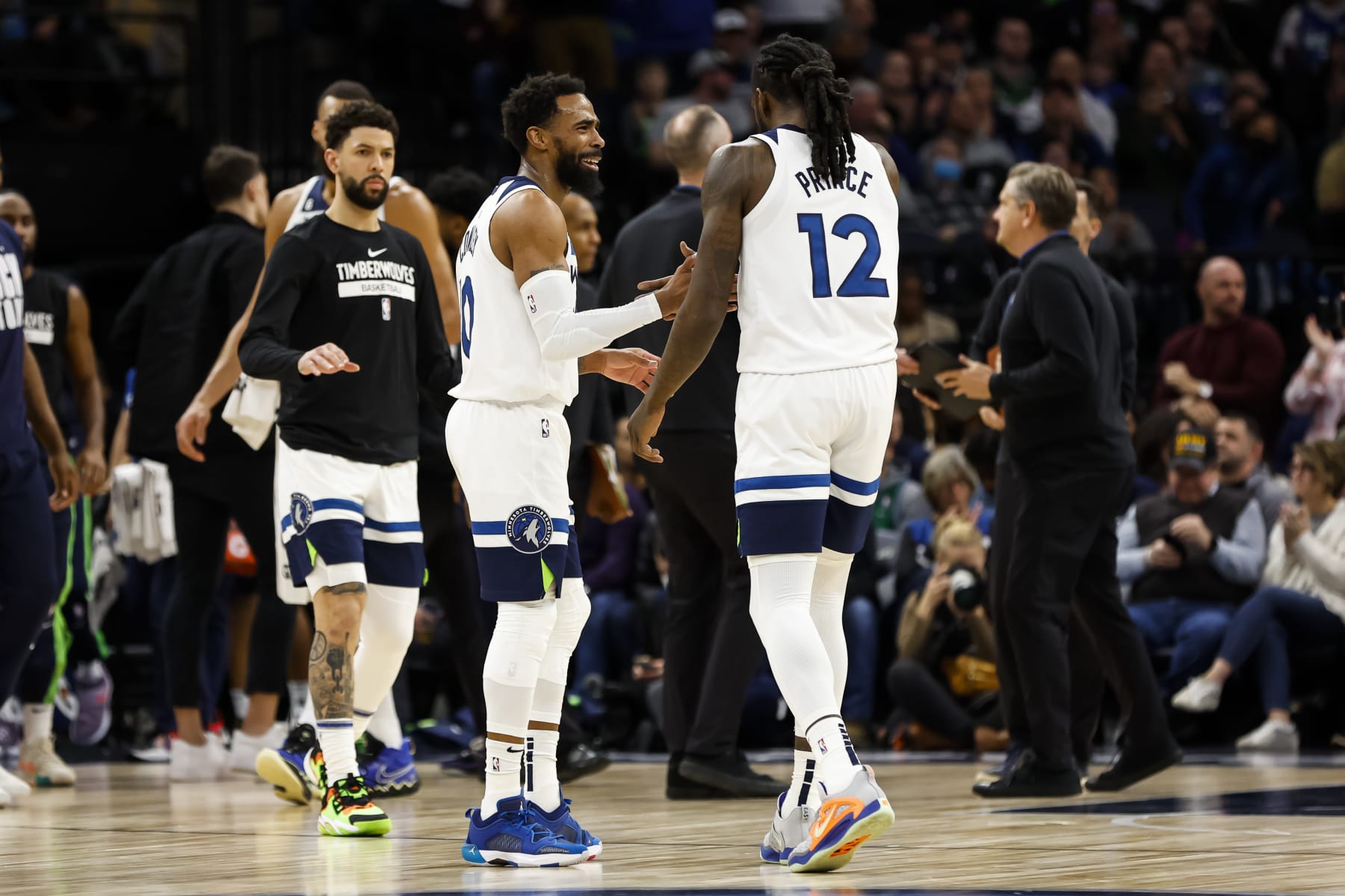 Austin Rivers, Mike Conley and Taurean Prince
