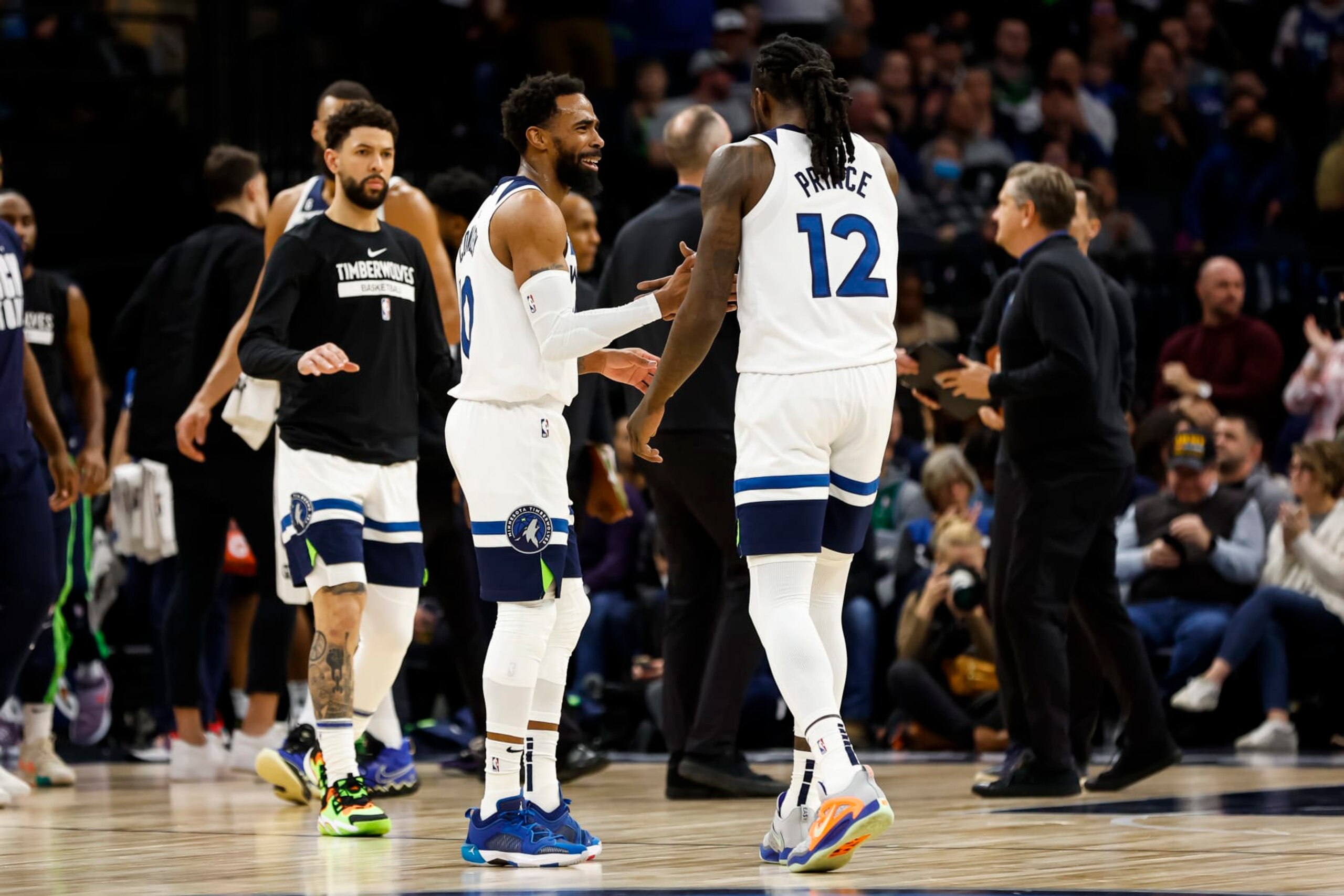 Austin Rivers, Mike Conley and Taurean Prince