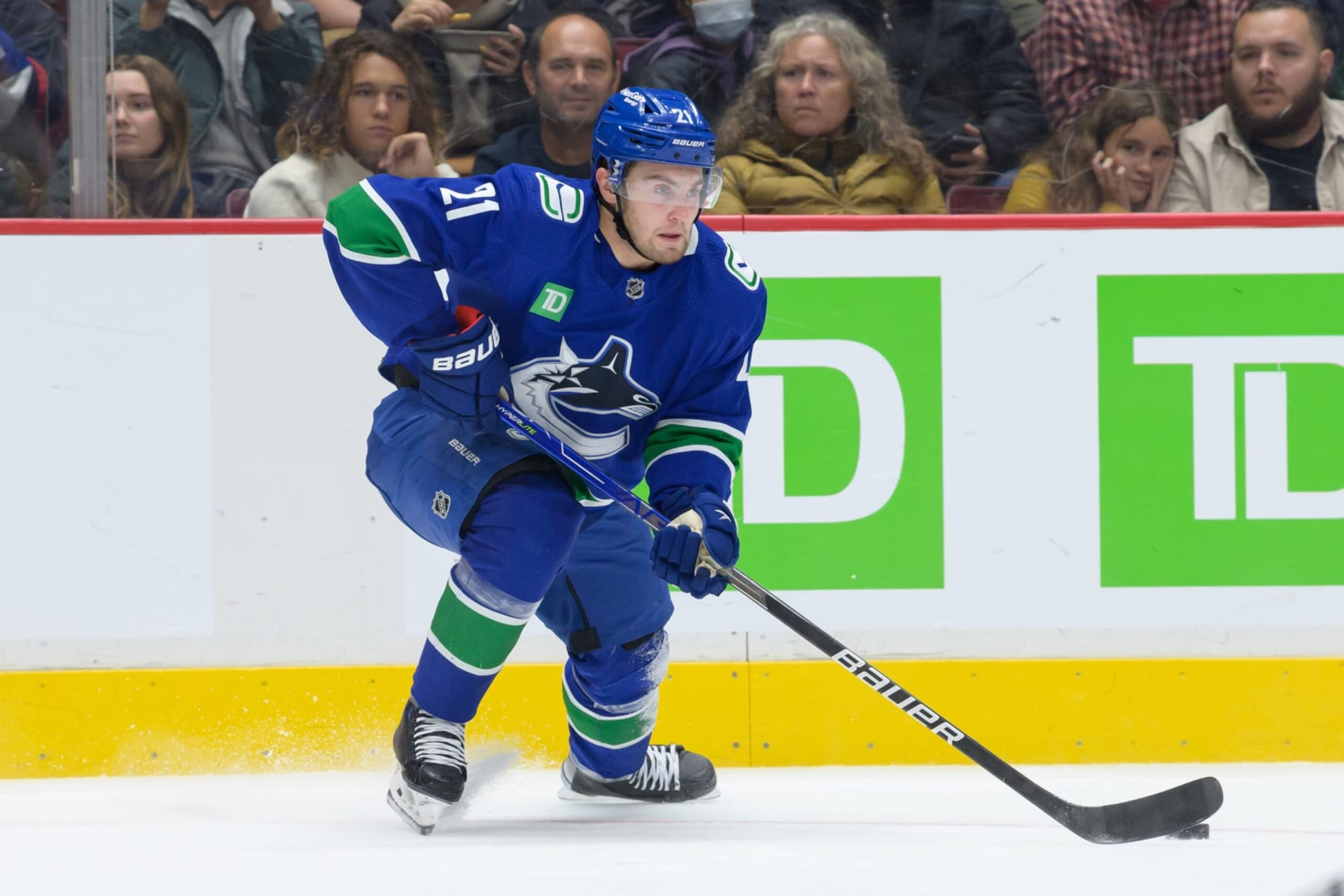 VANCOUVER, CANADA - NOVEMBER 05: Nils Hoglander #21 of the Vancouver Canucks skates with the puck during the first period of their NHL game against the Nashville Predators at Rogers Arena on November 5, 2022 in Vancouver, British Columbia, Canada. Nashville won 4-3. (Photo by Derek Cain/Getty Images) VANCOUVER, CANADA - NOVEMBER 05: Nils Hoglander #21 of the Vancouver Canucks skates with the puck during the first period of their NHL game against the Nashville Predators at Rogers Arena on November 5, 2022 in Vancouver, British Columbia, Canada. Nashville won 4-3. (Photo by Derek Cain/Getty Images)
