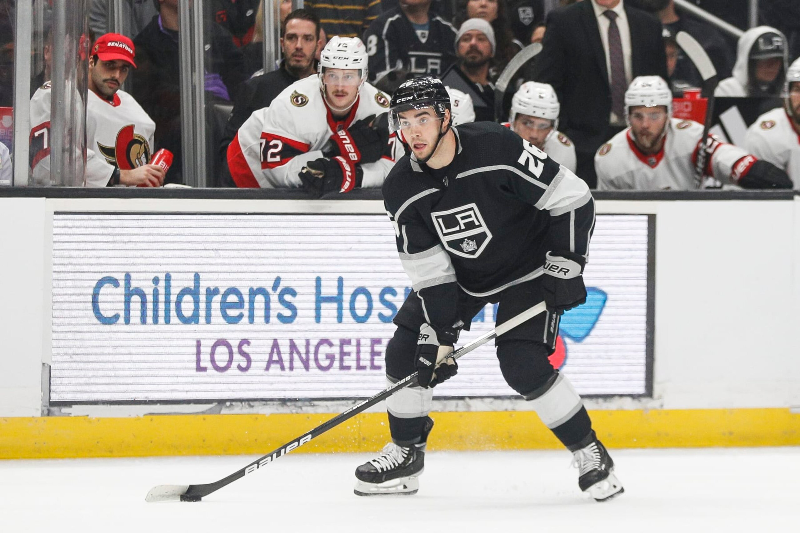 LOS ANGELES, CA - NOVEMBER 27: Los Angeles Kings defenseman Sean Walker (26) skates with the puck during an NHL hockey game against the Ottawa Senators on November 27, 2022 at Crypto.com Arena in Los Angeles, CA. (Photo by Brandon Sloter/Icon Sportswire via Getty Images) LOS ANGELES, CA - NOVEMBER 27: Los Angeles Kings defenseman Sean Walker (26) skates with the puck during an NHL hockey game against the Ottawa Senators on November 27, 2022 at Crypto.com Arena in Los Angeles, CA. (Photo by Brandon Sloter/Icon Sportswire via Getty Images)