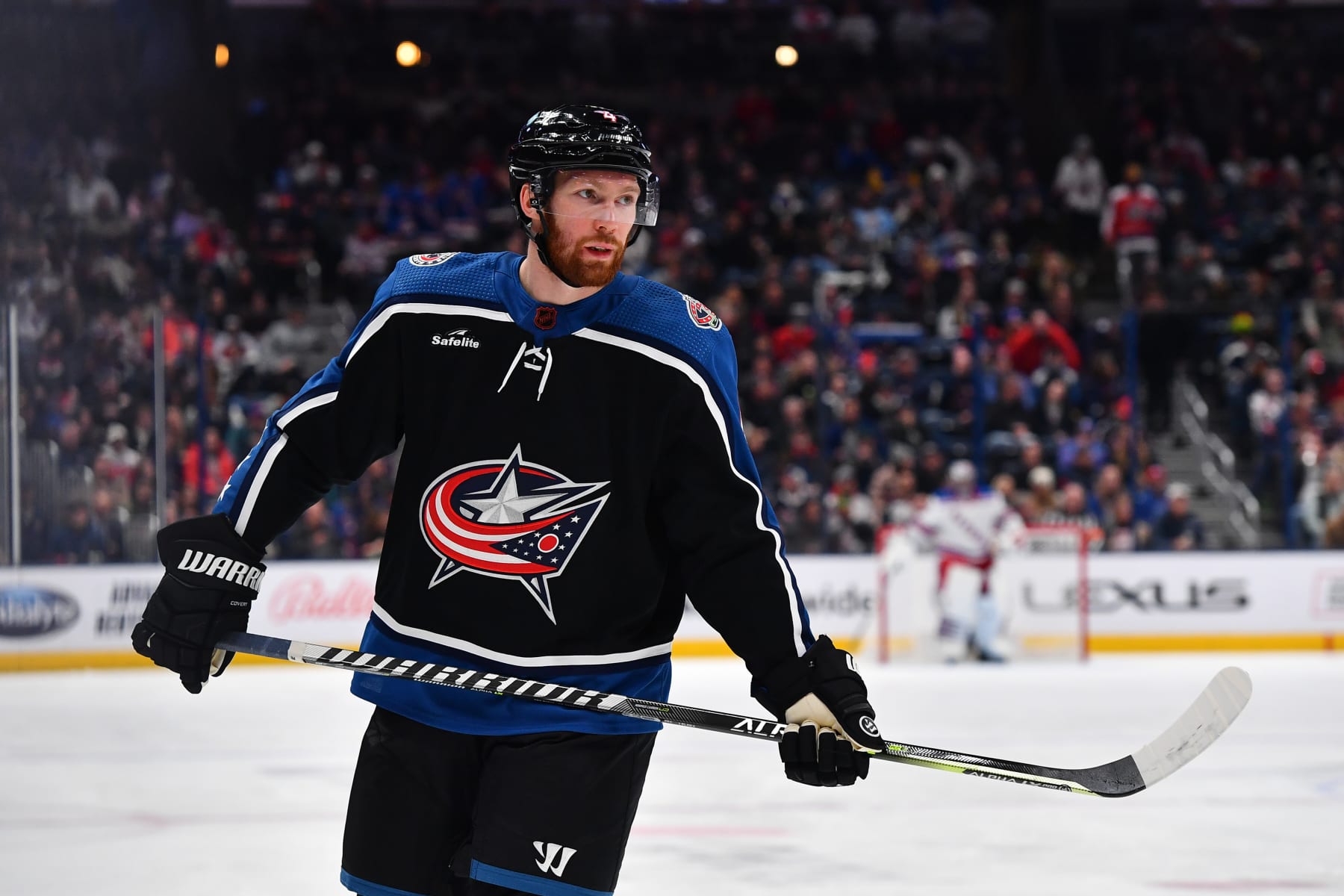 COLUMBUS, OHIO - JANUARY 16: Vladislav Gavrikov #4 of the Columbus Blue Jackets lines up prior to a face-off during the second period of a game against the New York Rangers at Nationwide Arena on January 16, 2023 in Columbus, Ohio. (Photo by Ben Jackson/NHLI via Getty Images)