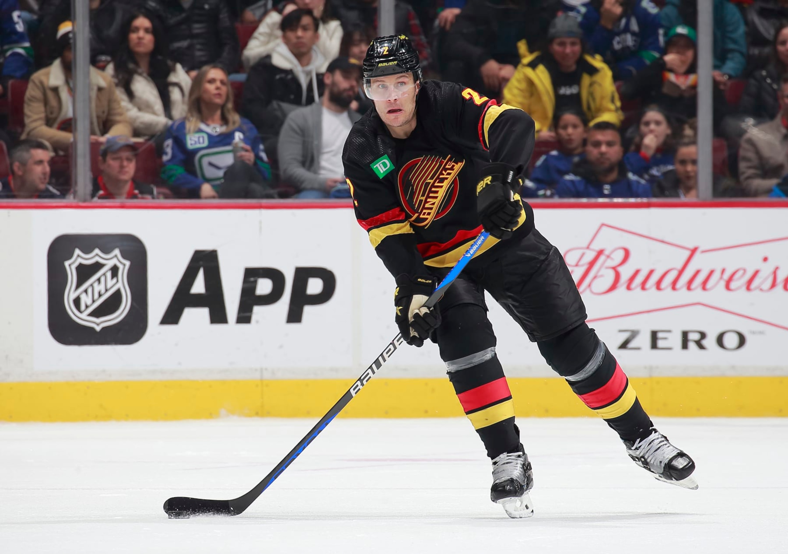 VANCOUVER, CANADA - JANUARY 27: Luke Schenn #2 of the Vancouver Canucks skates up ice during their NHL game against the Columbus Blue Jackets at Rogers Arena January 27, 2023 in Vancouver, British Columbia, Canada.  (Photo by Jeff Vinnick/NHLI via Getty Images)