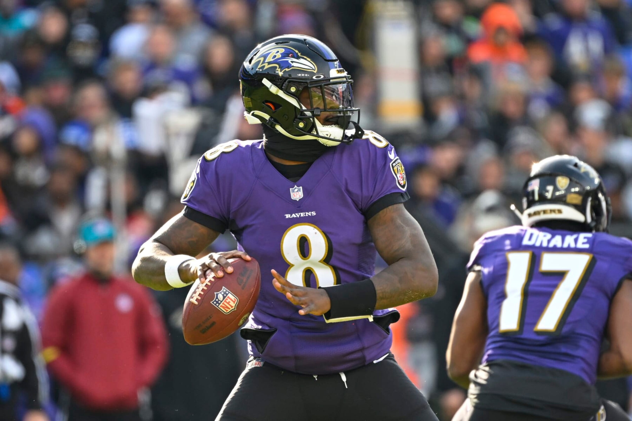Baltimore Ravens quarterback Lamar Jackson (8) looks to pass the ball during the first half of an NFL football game against the Denver Broncos, Sunday, Dec. 4, 2022, in Baltimore. (AP Photo/Terrance Williams)