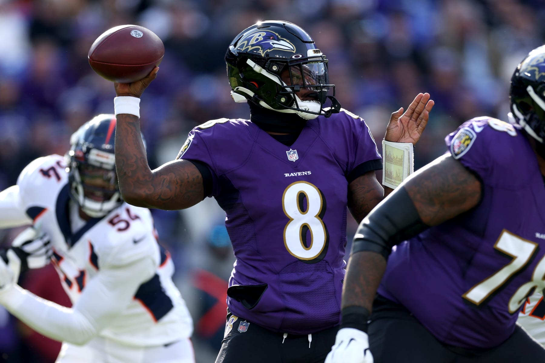 BALTIMORE, MARYLAND - DECEMBER 04: Lamar Jackson #8 of the Baltimore Ravens looks to pass in the first quarter of a game against the Denver Broncos at M&T Bank Stadium on December 04, 2022 in Baltimore, Maryland. (Photo by Rob Carr/Getty Images)