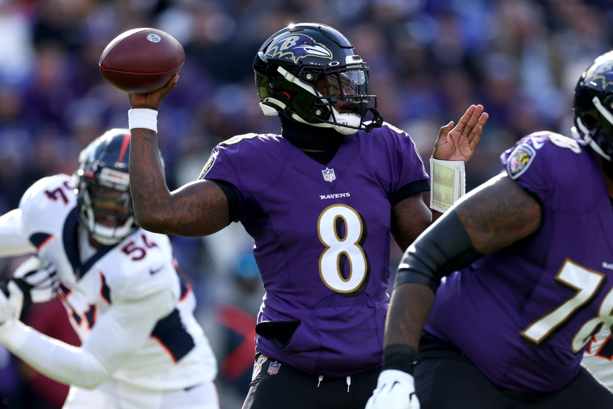 BALTIMORE, MARYLAND - DECEMBER 04: Lamar Jackson #8 of the Baltimore Ravens looks to pass in the first quarter of a game against the Denver Broncos at M&T Bank Stadium on December 04, 2022 in Baltimore, Maryland. (Photo by Rob Carr/Getty Images)