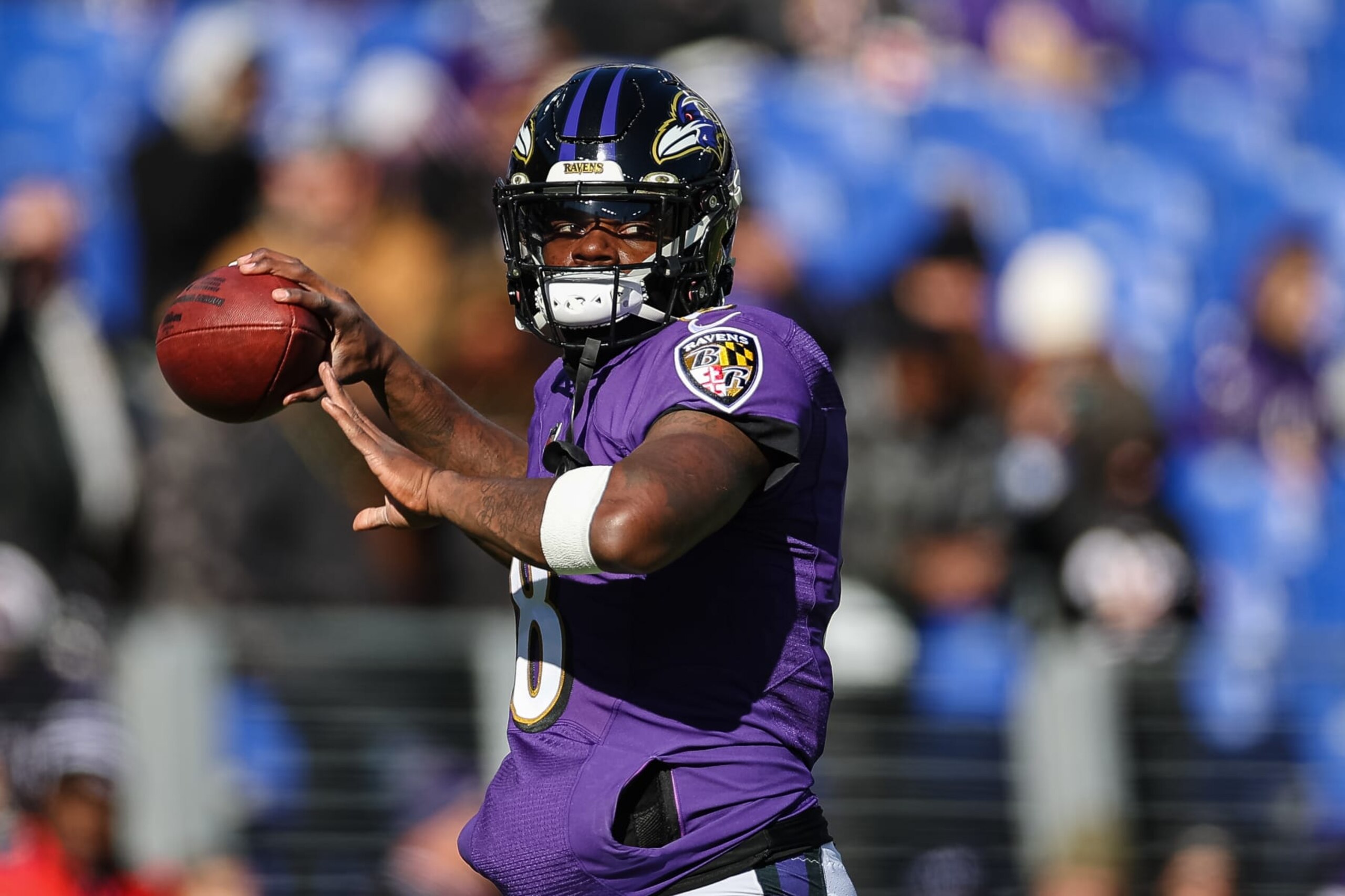 BALTIMORE, MD - NOVEMBER 20: Lamar Jackson #8 of the Baltimore Ravens attempts a pass before the game against the Carolina Panthers at M&T Bank Stadium on November 20, 2022 in Baltimore, Maryland. (Photo by Scott Taetsch/Getty Images)