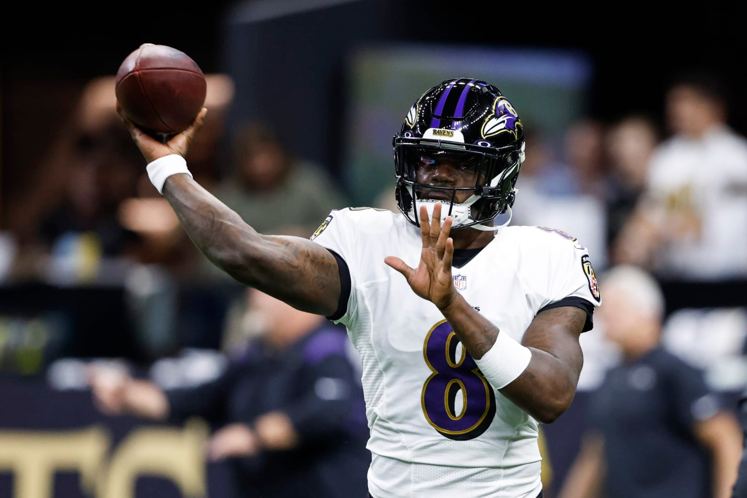 Baltimore Ravens quarterback Lamar Jackson (8) warms up before an NFL football game against the New Orleans Saints in New Orleans, Monday, Nov. 7, 2022. (AP Photo/Butch Dill)