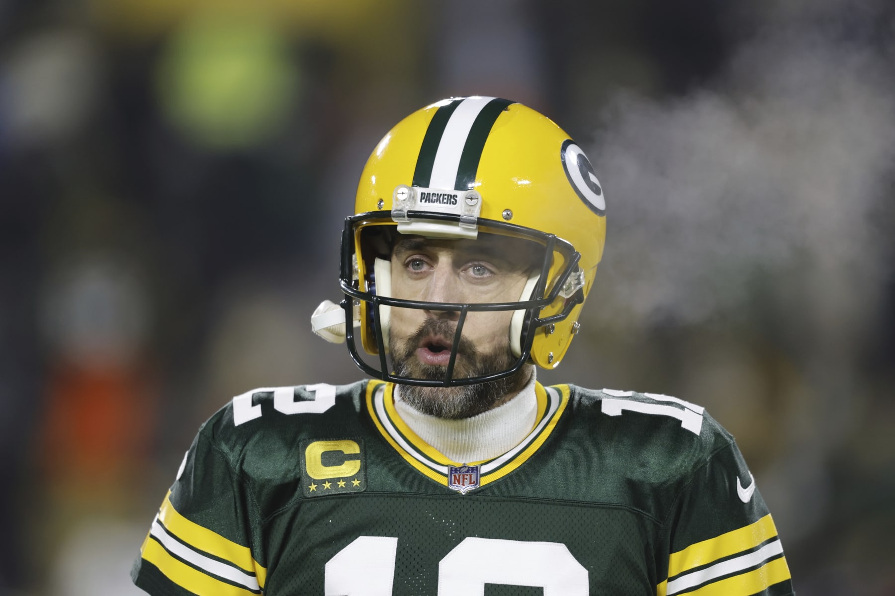 Green Bay Packers quarterback Aaron Rodgers (12) warms up before an NFL football game against the Detroit Lions Sunday, Jan. 8, 2023, in Green Bay, Wis. (AP Photo/Jeffrey Phelps)