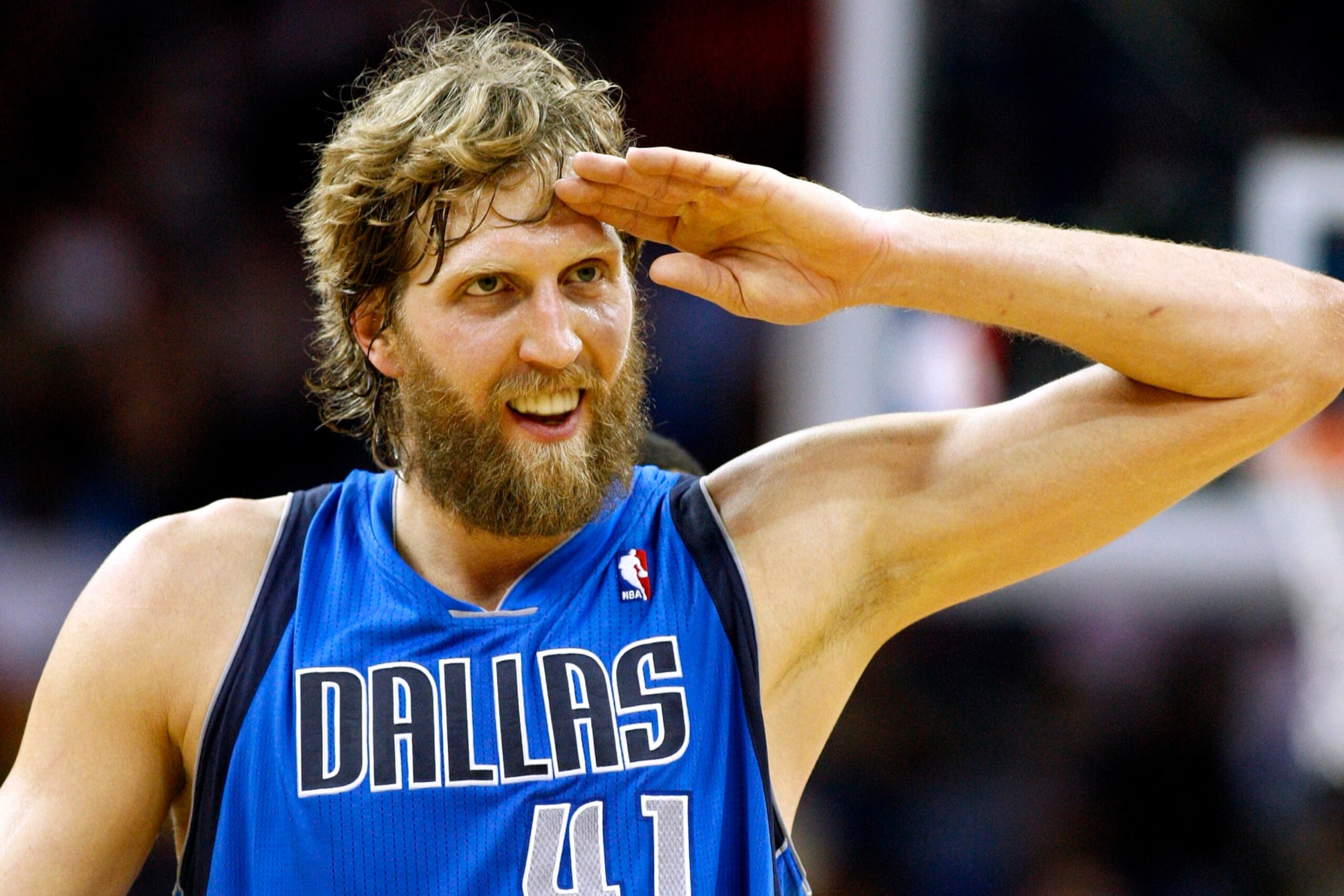 FILE - Dallas Mavericks power forward Dirk Nowitzki celebrates after scoring his 25,000 career point during the first half of an NBA basketball game against the New Orleans Hornets in New Orleans, April 14, 2013. (AP Photo/Jonathan Bachman, File) FILE - Dallas Mavericks power forward Dirk Nowitzki celebrates after scoring his 25,000 career point during the first half of an NBA basketball game against the New Orleans Hornets in New Orleans, April 14, 2013. (AP Photo/Jonathan Bachman, File)