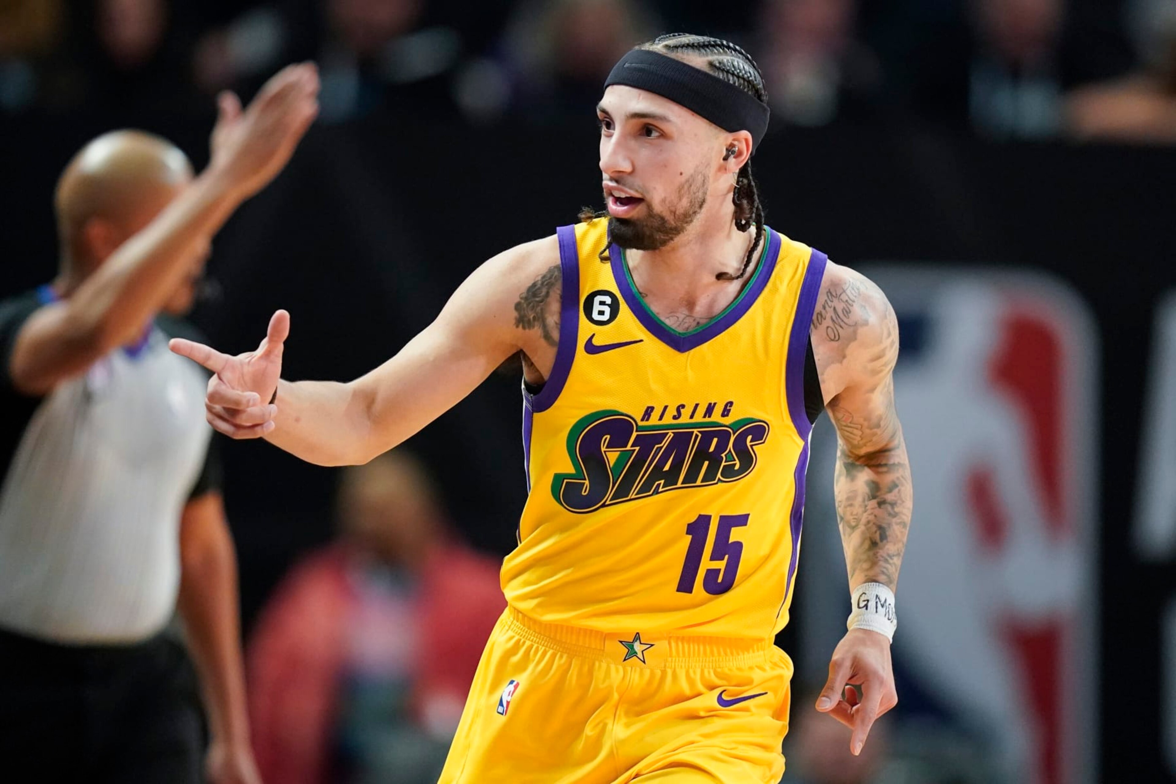 Team Pau Gasol's Jose Alvarado, of the New Orleans Pelicans, points to the bench during an NBA Rising Stars semifinal basketball game against Team Deron Williams, Friday, Feb. 17, 2023, in Salt Lake City. (AP Photo/Rick Bowmer)