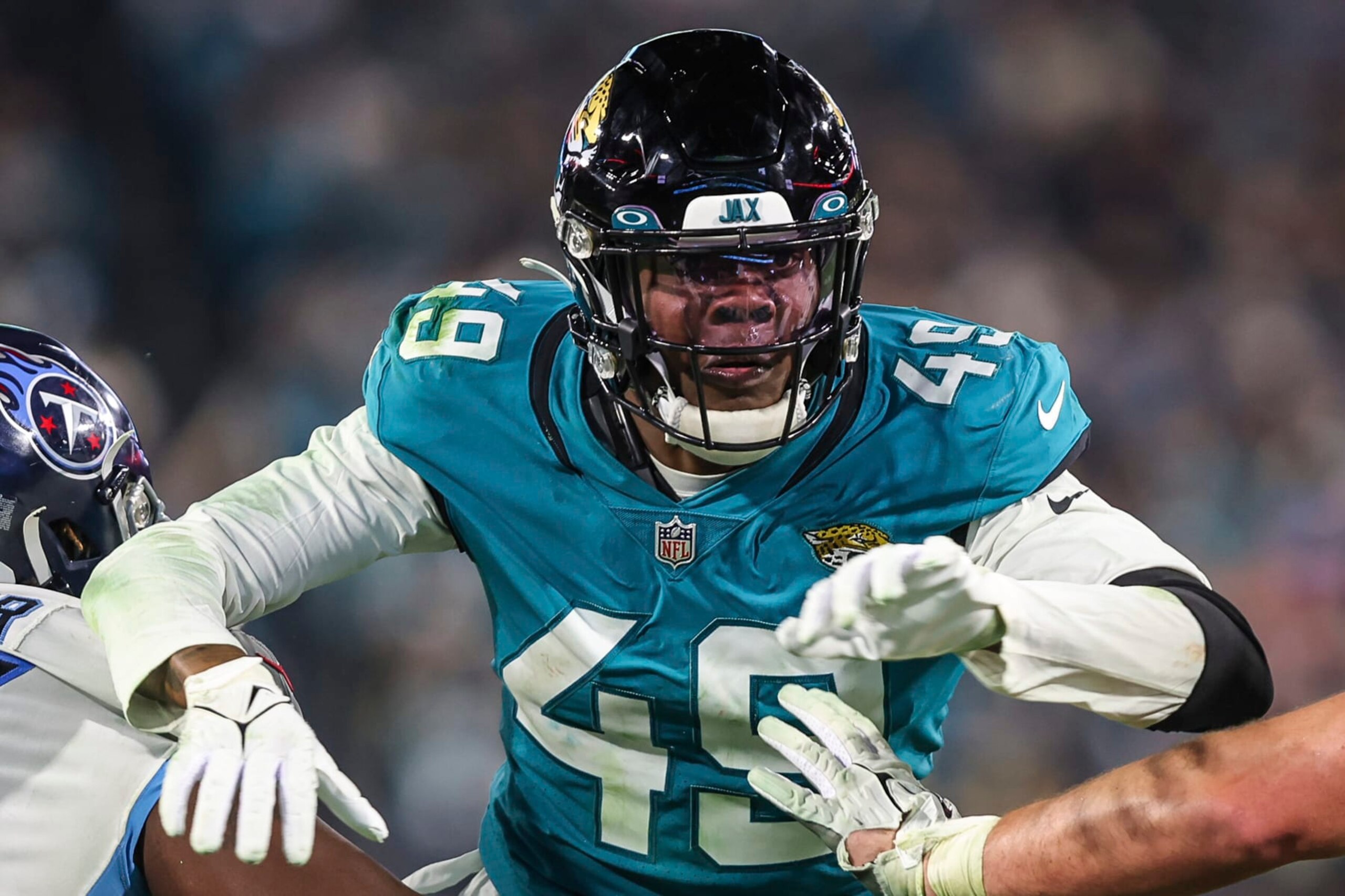 Jacksonville Jaguars defensive end Arden Key (49) in action during an NFL football game against the Tennessee Titans, Saturday, Jan. 7, 2023, in Jacksonville, Fla. The Jaguars defeated the Titans 20-16. (AP Photo/Gary McCullough)