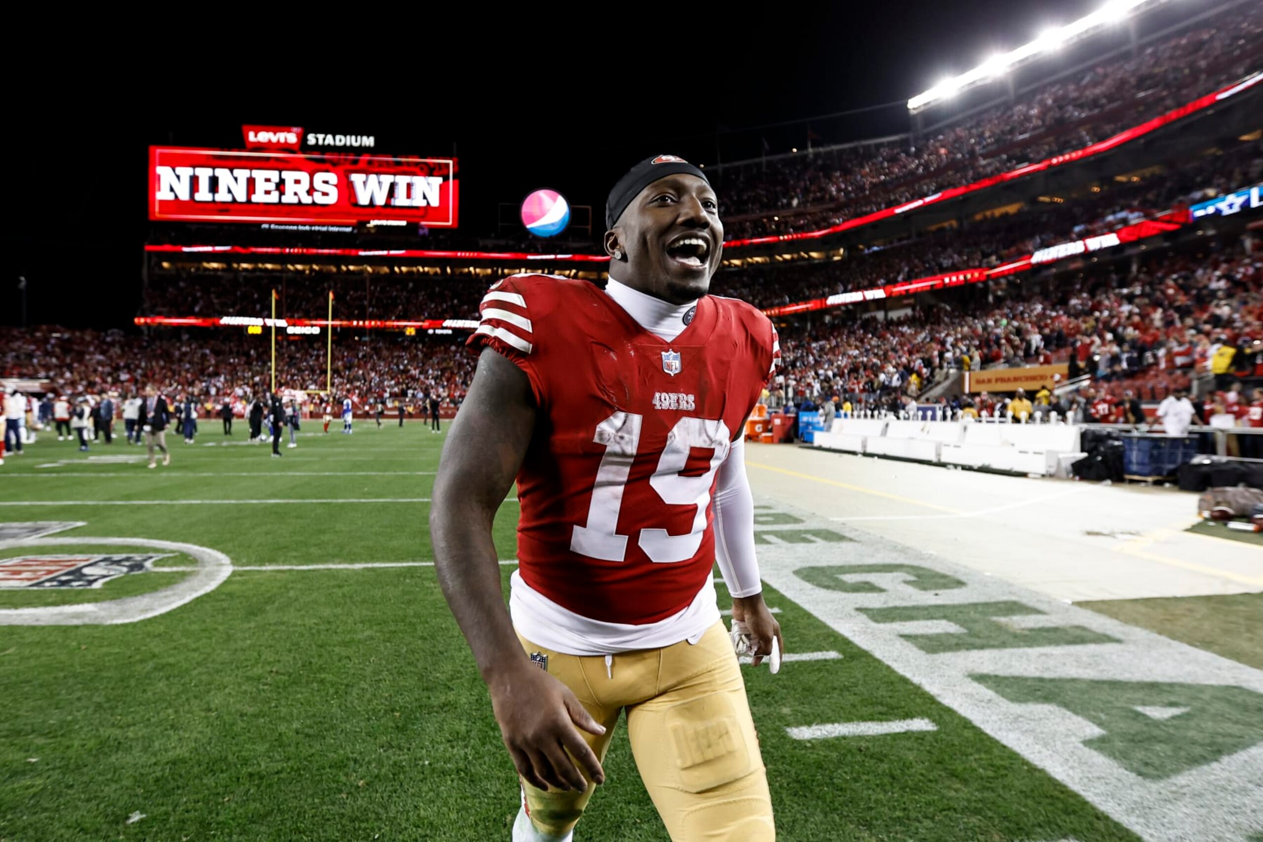 SANTA CLARA, CALIFORNIA - JANUARY 22: Deebo Samuel #19 of the San Francisco 49ers celebrates after defeating the Dallas Cowboys during an NFL divisional round playoff football game between the San Francisco 49ers and the Dallas Cowboys at Levi's Stadium on January 22, 2023 in Santa Clara, California. (Photo by Michael Owens/Getty Images) SANTA CLARA, CALIFORNIA - JANUARY 22: Deebo Samuel #19 of the San Francisco 49ers celebrates after defeating the Dallas Cowboys during an NFL divisional round playoff football game between the San Francisco 49ers and the Dallas Cowboys at Levi's Stadium on January 22, 2023 in Santa Clara, California. (Photo by Michael Owens/Getty Images)