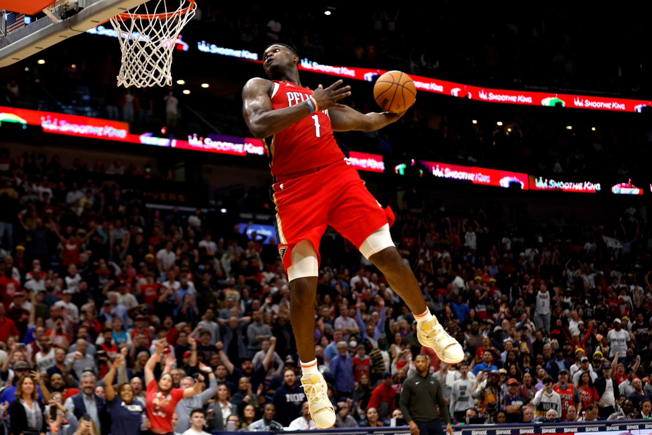 NEW ORLEANS, LOUISIANA - DECEMBER 09: Zion Williamson #1 of the New Orleans Pelicans dunks the ball during the fourth quarter of an NBA game against the Phoenix Suns at Smoothie King Center on December 09, 2022 in New Orleans, Louisiana. NOTE TO USER: User expressly acknowledges and agrees that, by downloading and or using this photograph, User is consenting to the terms and conditions of the Getty Images License Agreement. (Photo by Sean Gardner/Getty Images) NEW ORLEANS, LOUISIANA - DECEMBER 09: Zion Williamson #1 of the New Orleans Pelicans dunks the ball during the fourth quarter of an NBA game against the Phoenix Suns at Smoothie King Center on December 09, 2022 in New Orleans, Louisiana. NOTE TO USER: User expressly acknowledges and agrees that, by downloading and or using this photograph, User is consenting to the terms and conditions of the Getty Images License Agreement. (Photo by Sean Gardner/Getty Images)