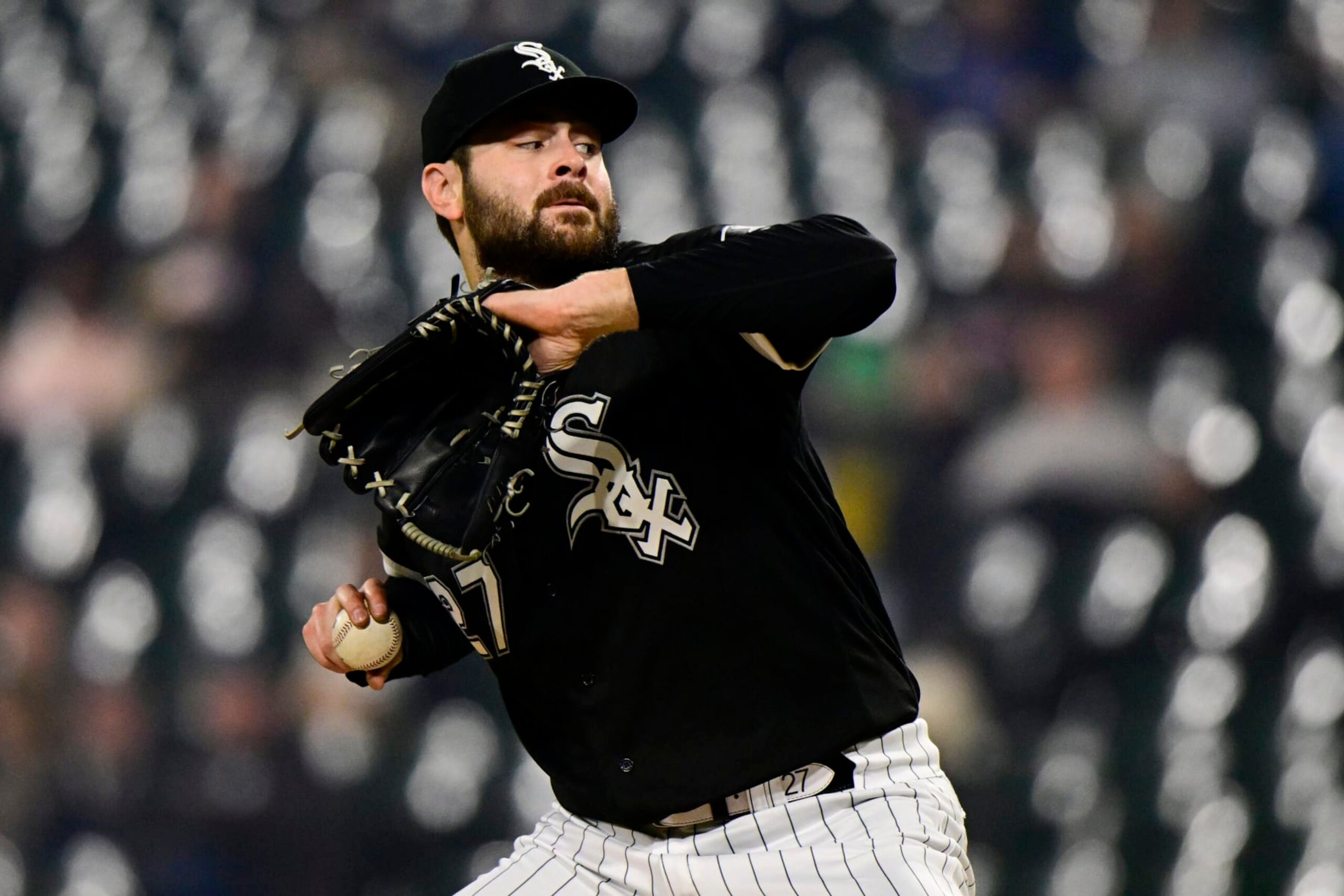 CHICAGO, ILLINOIS - OCTOBER 04: Starting pitcher Lucas Giolito #27 of the Chicago White Sox delivers a pitch in the first inning against the Minnesota Twins at Guaranteed Rate Field on October 04, 2022 in Chicago, Illinois. (Photo by Quinn Harris/Getty Images)