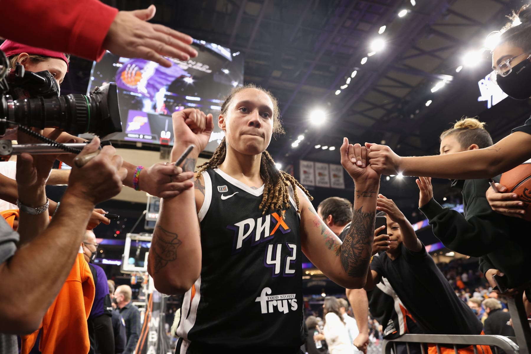 PHOENIX, ARIZONA - OCTOBER 13: Brittney Griner #42 of the Phoenix Mercury celebrates with fans following Game Two of the 2021 WNBA Finals at Footprint Center on October 13, 2021 in Phoenix, Arizona. The Mercury defeated the Sky 91-86 in overtime. NOTE TO USER: User expressly acknowledges and agrees that, by downloading and or using this photograph, User is consenting to the terms and conditions of the Getty Images License Agreement. (Photo by Christian Petersen/Getty Images) PHOENIX, ARIZONA - OCTOBER 13: Brittney Griner #42 of the Phoenix Mercury celebrates with fans following Game Two of the 2021 WNBA Finals at Footprint Center on October 13, 2021 in Phoenix, Arizona. The Mercury defeated the Sky 91-86 in overtime. NOTE TO USER: User expressly acknowledges and agrees that, by downloading and or using this photograph, User is consenting to the terms and conditions of the Getty Images License Agreement. (Photo by Christian Petersen/Getty Images)