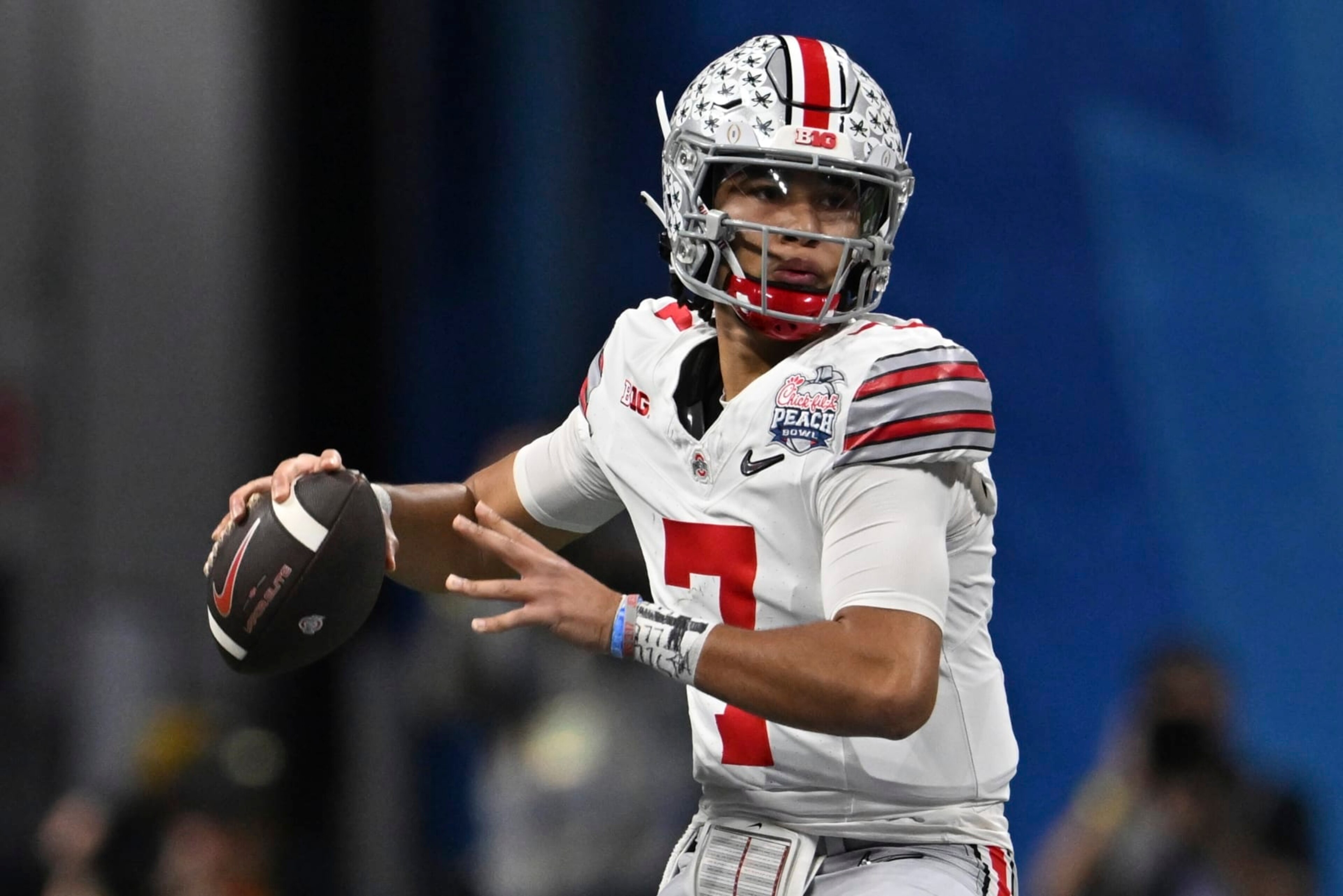 Ohio State quarterback C.J. Stroud (7) passes against Georgia during the first half of the Peach Bowl NCAA college football semifinal playoff game, Saturday, Dec. 31, 2022, in Atlanta. (AP Photo/Danny Karnik)