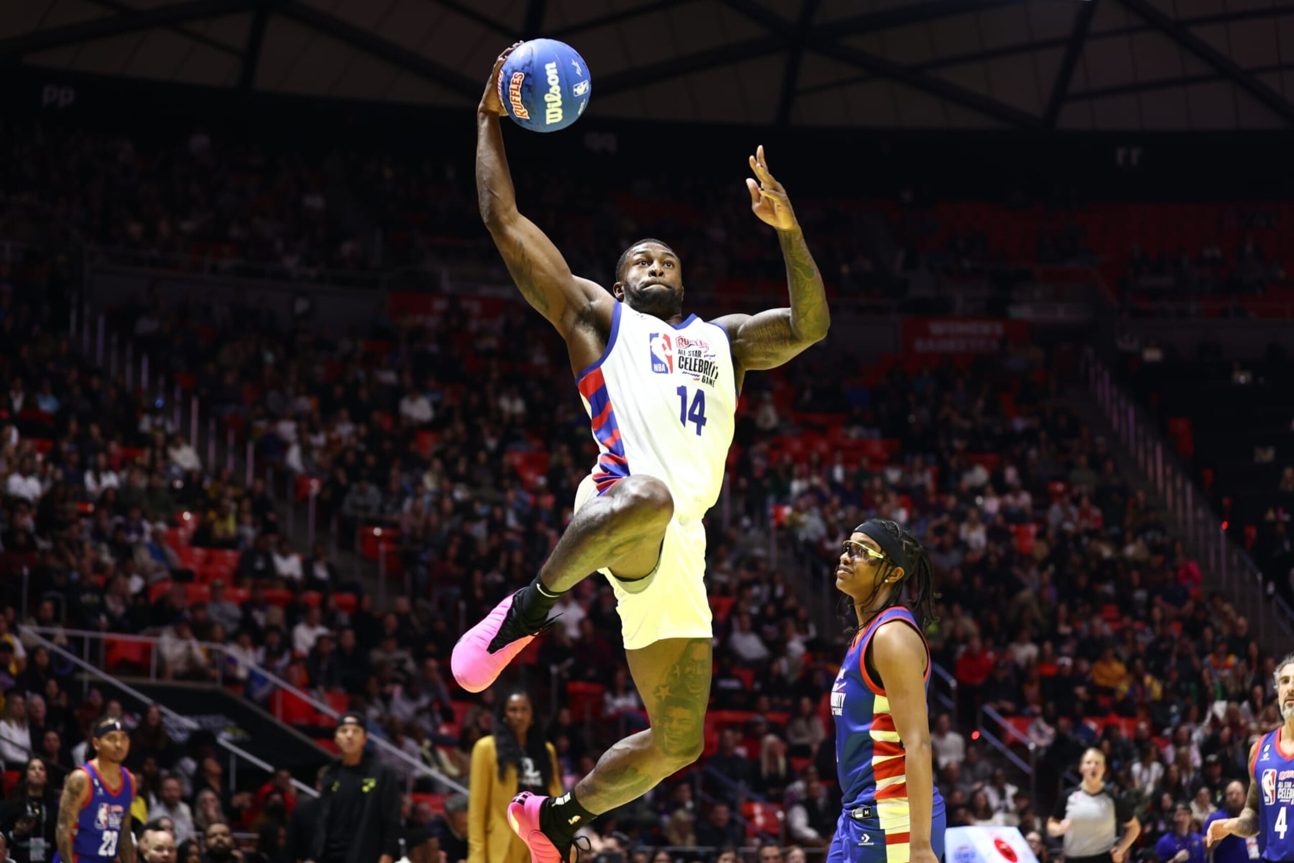 SALT LAKE CITY, UT - FEBRUARY 17: DK Metcalf #14 of Team Dwyane drives to the basket during Ruffles NBA All-Star Celebrity Game as part of 2023 NBA All Star Weekend on Friday, February 17, 2023 at the Jon M. Huntsman Center in Salt Lake City, Utah. NOTE TO USER: User expressly acknowledges and agrees that, by downloading and/or using this Photograph, user is consenting to the terms and conditions of the Getty Images License Agreement. Mandatory Copyright Notice: Copyright 2023 NBAE (Photo by Ned Dishman/NBAE via Getty Images)