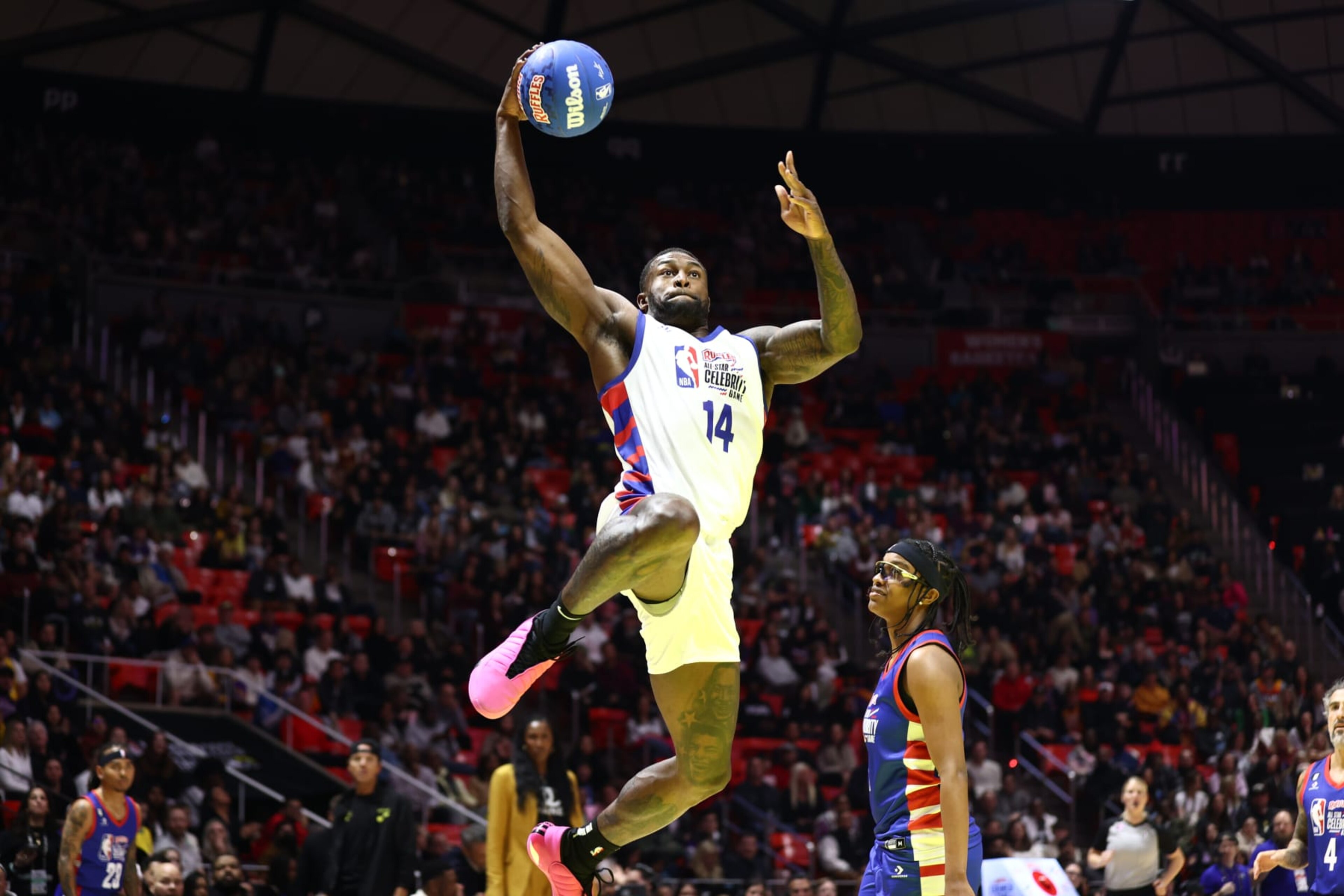 SALT LAKE CITY, UT - FEBRUARY 17: DK Metcalf #14 of Team Dwyane drives to the basket during Ruffles NBA All-Star Celebrity Game as part of 2023 NBA All Star Weekend on Friday, February 17, 2023 at the Jon M. Huntsman Center in Salt Lake City, Utah. NOTE TO USER: User expressly acknowledges and agrees that, by downloading and/or using this Photograph, user is consenting to the terms and conditions of the Getty Images License Agreement. Mandatory Copyright Notice: Copyright 2023 NBAE (Photo by Ned Dishman/NBAE via Getty Images)