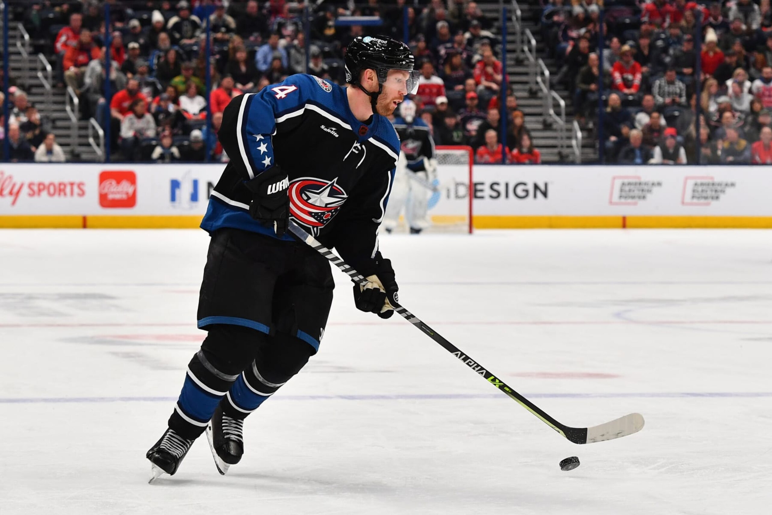 COLUMBUS, OHIO - JANUARY 31: Vladislav Gavrikov #4 of the Columbus Blue Jackets skates with the puck during the third period of a game against the Washington Capitals at Nationwide Arena on January 31, 2023 in Columbus, Ohio. (Photo by Ben Jackson/NHLI via Getty Images)