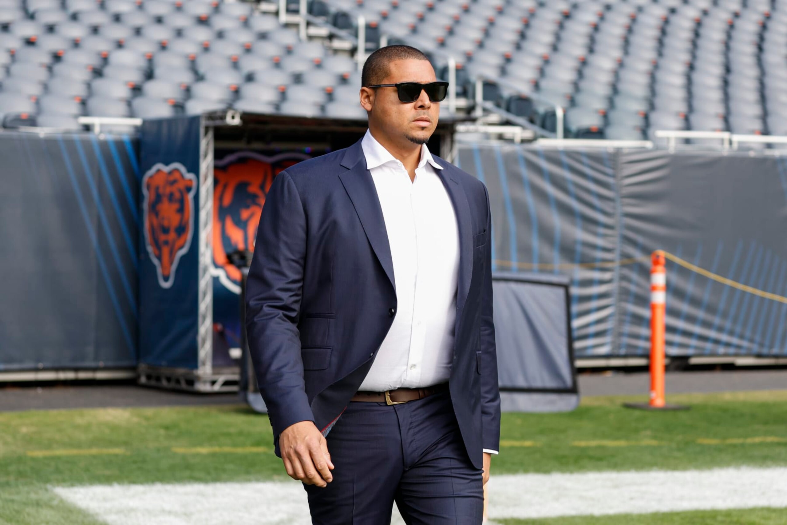Chicago Bears NFL football team general manager Ryan Poles walks on the field prior to an NFL football game between the Chicago Bears and Miami Dolphins, Sunday, Nov. 6, 2022, in Chicago. (AP Photo/Kamil Krzaczynski)