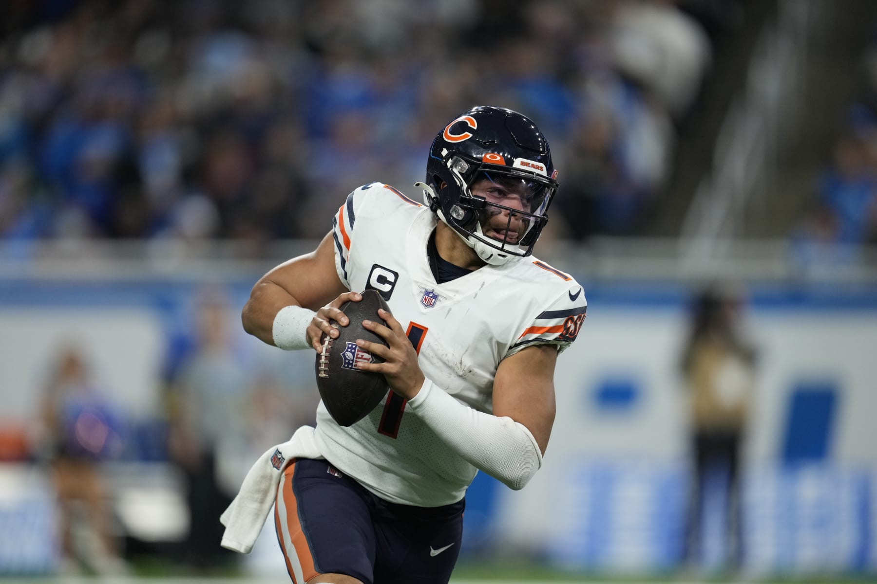 Chicago Bears quarterback Justin Fields plays during the second half of an NFL football game against the Detroit Lions, Sunday, Jan. 1, 2023, in Detroit. (AP Photo/Paul Sancya)