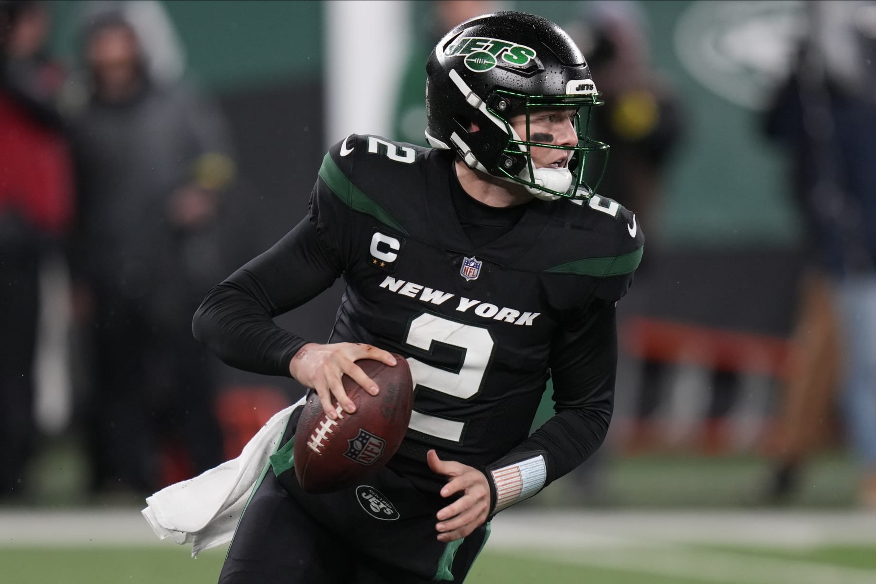 New York Jets quarterback Zach Wilson (2) looks to pass against the Jacksonville Jaguars during the third quarter of an NFL football game, Thursday, Dec. 22, 2022, in East Rutherford, N.J. (AP Photo/Seth Wenig)
