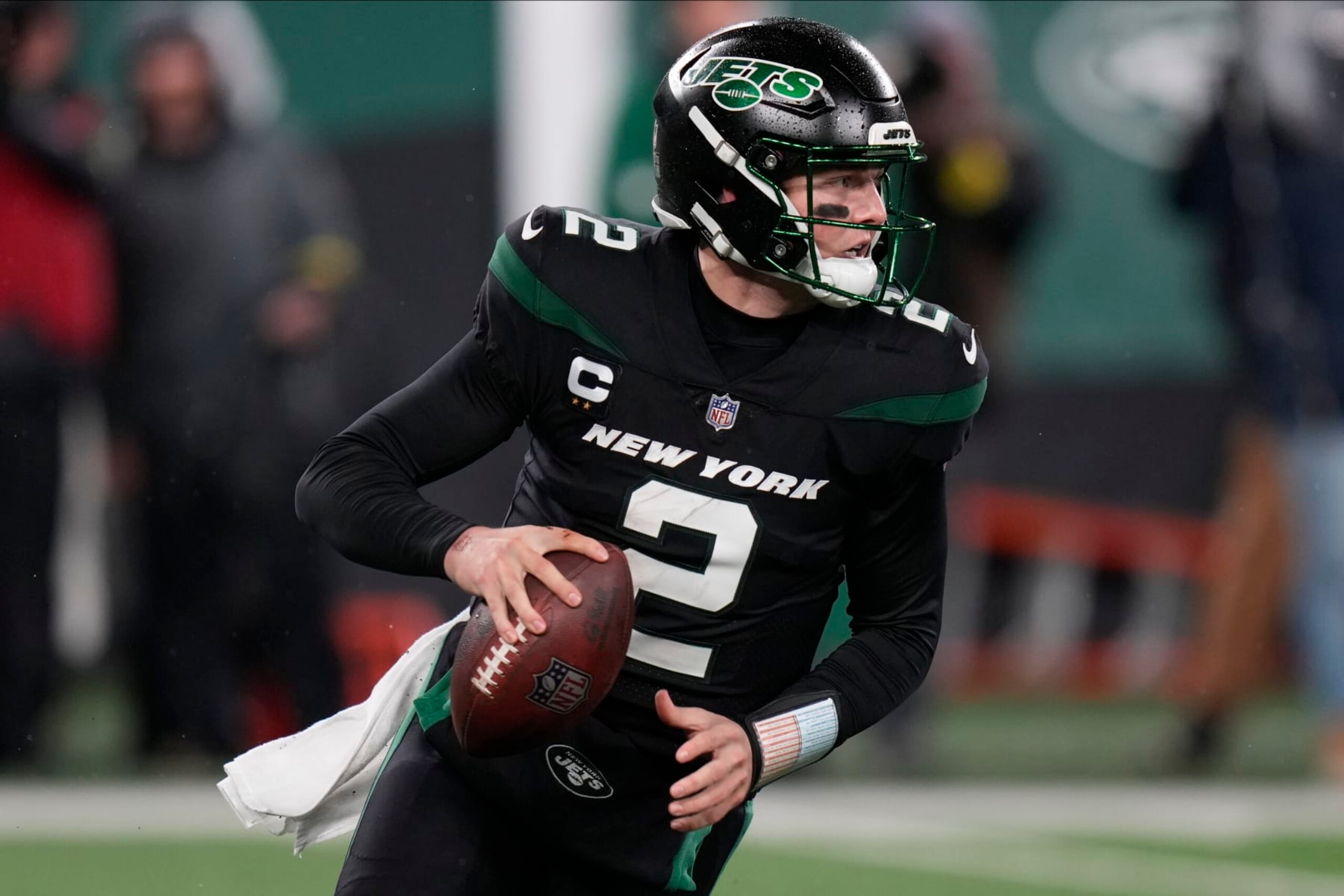 New York Jets quarterback Zach Wilson (2) looks to pass against the Jacksonville Jaguars during the third quarter of an NFL football game, Thursday, Dec. 22, 2022, in East Rutherford, N.J. (AP Photo/Seth Wenig)