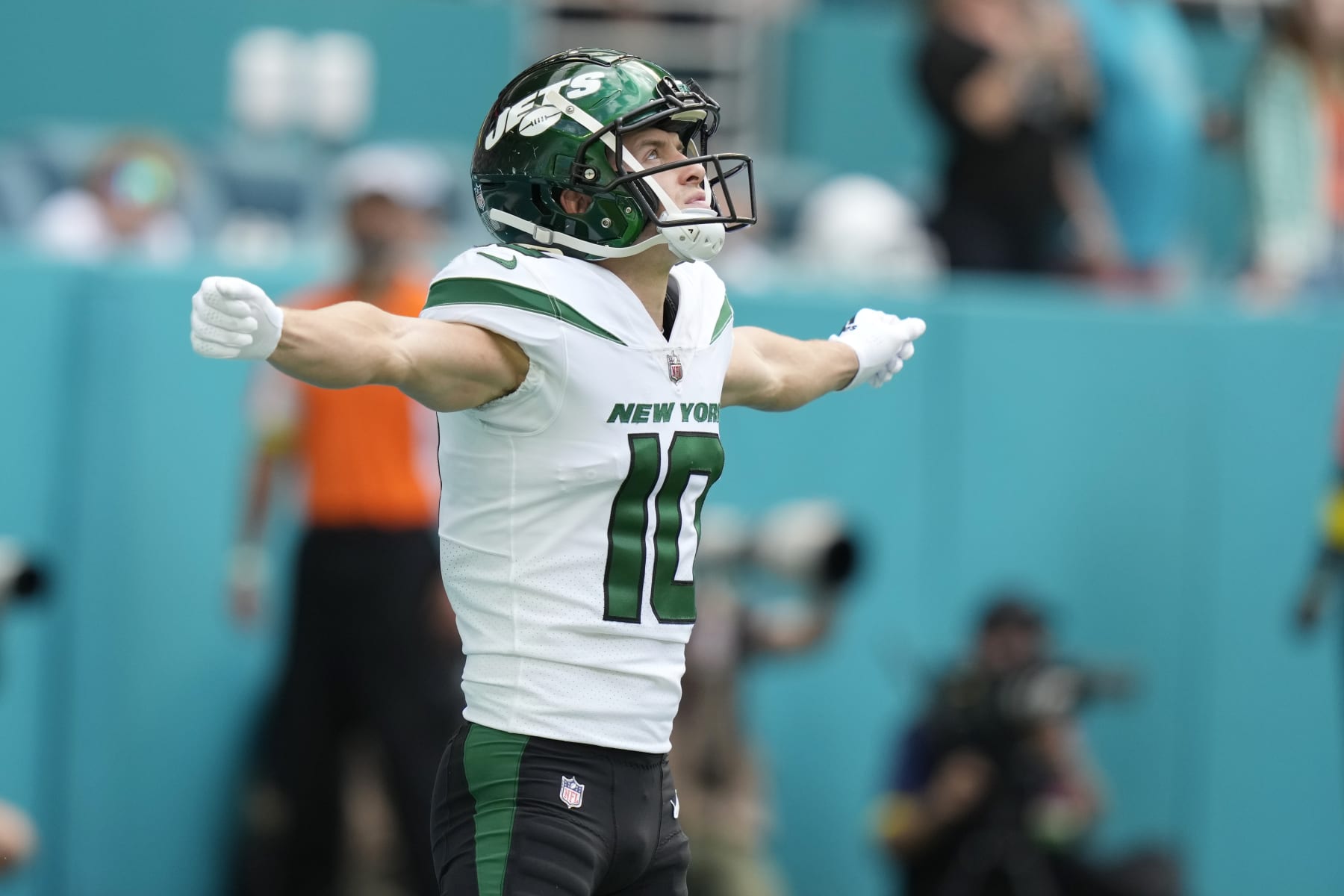 New York Jets wide receiver Braxton Berrios (10) gestures during the first half of an NFL football game against the Miami Dolphins, Sunday, Jan. 8, 2023, in Miami Gardens, Fla. (AP Photo/Lynne Sladky)