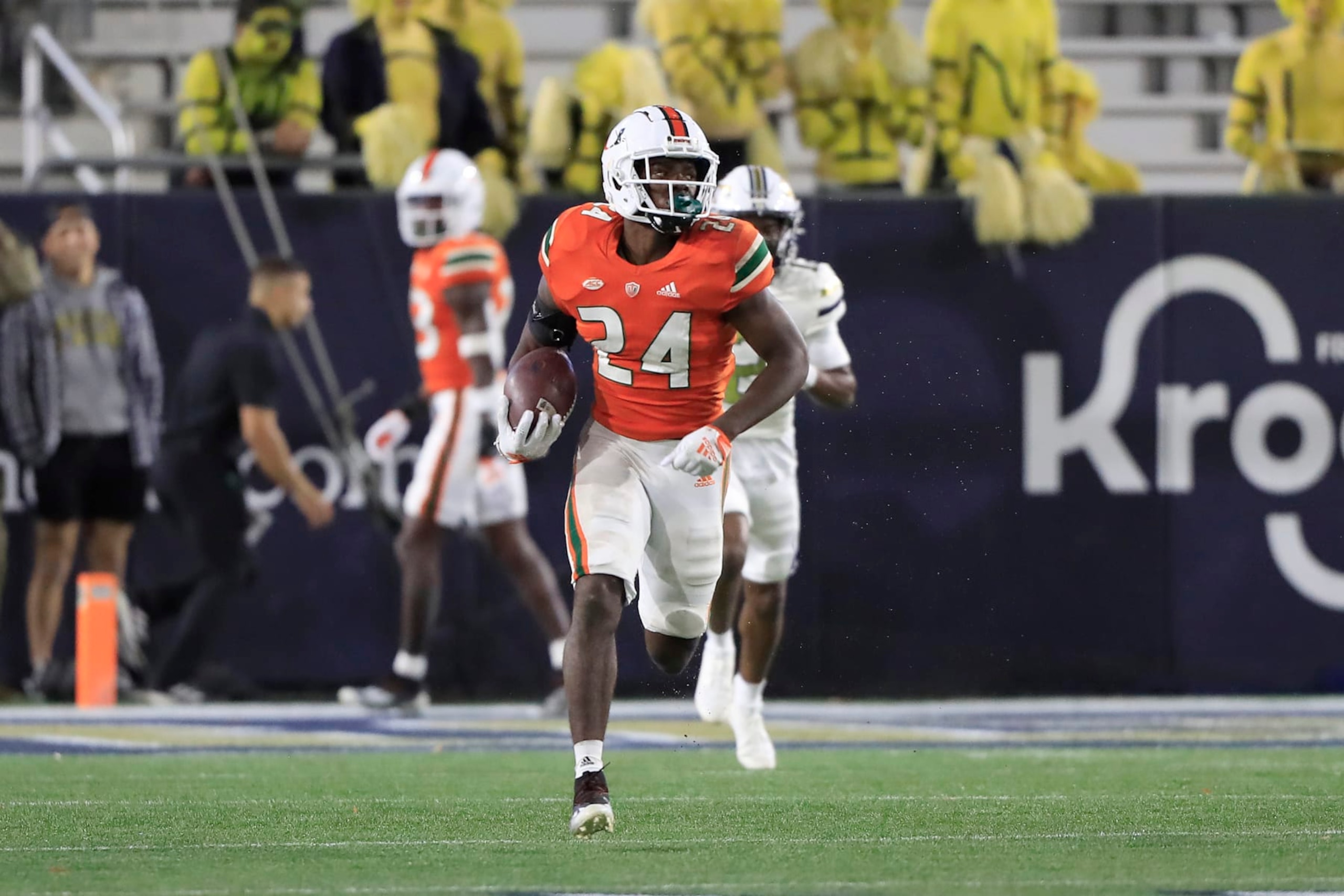 ATLANTA, GA - NOVEMBER 12: Miami Hurricanes safety Kamren Kinchens (24) runs back an interception for a touchdown during the Saturday afternoon college football game between the Miami Hurricanes and the Georgia Tech Yellow Jackets on November 12, 2022 at Bobby Dodd Stadium in Atlanta, GA. (Photo by David J. Griffin/Icon Sportswire via Getty Images) ATLANTA, GA - NOVEMBER 12: Miami Hurricanes safety Kamren Kinchens (24) runs back an interception for a touchdown during the Saturday afternoon college football game between the Miami Hurricanes and the Georgia Tech Yellow Jackets on November 12, 2022 at Bobby Dodd Stadium in Atlanta, GA. (Photo by David J. Griffin/Icon Sportswire via Getty Images)