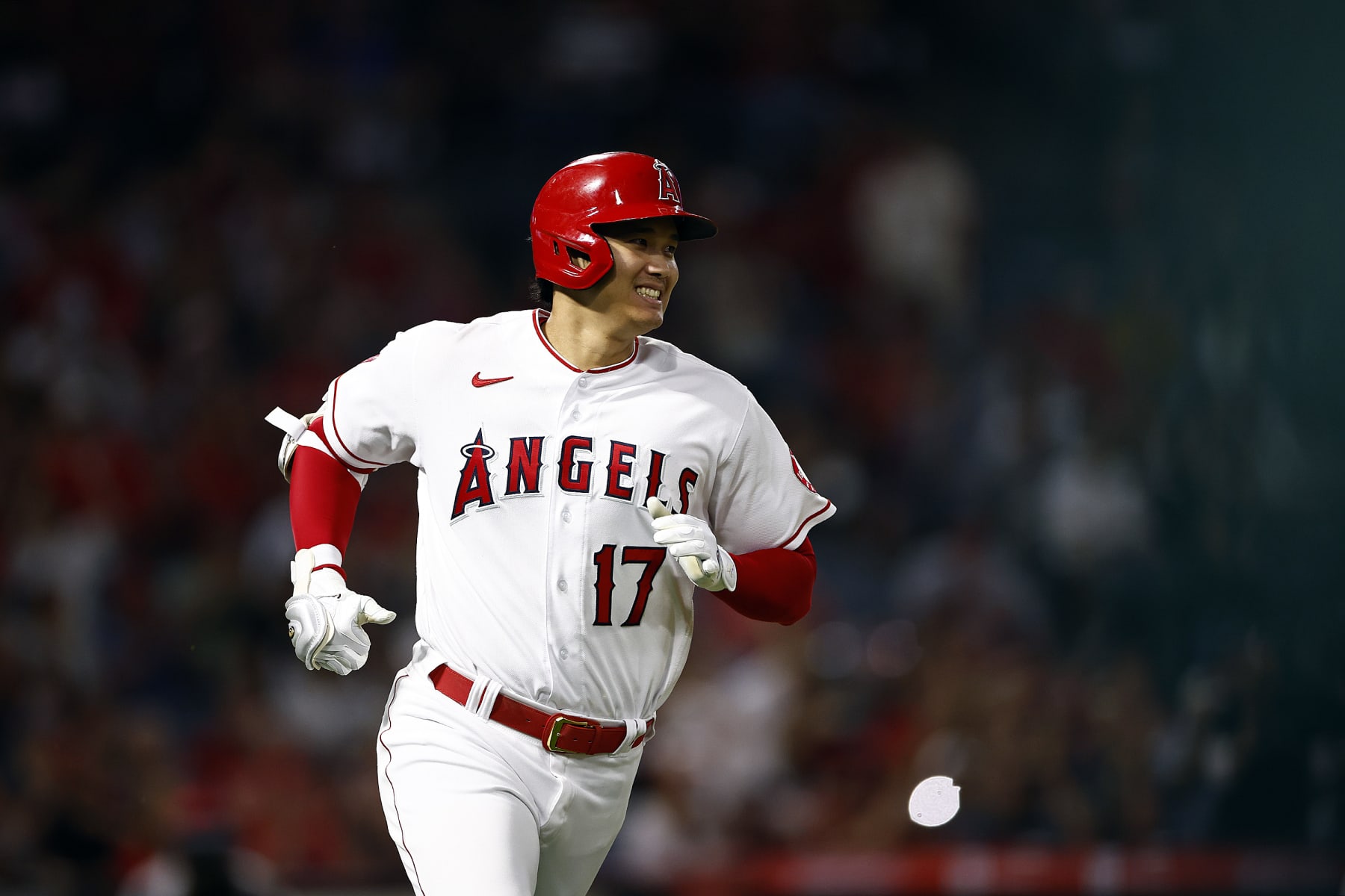 ANAHEIM, CALIFORNIA - SEPTEMBER 28:  Shohei Ohtani #17 of the Los Angeles Angels singles against the Oakland Athletics in the fourth inning at Angel Stadium of Anaheim on September 28, 2022 in Anaheim, California. (Photo by Ronald Martinez/Getty Images)